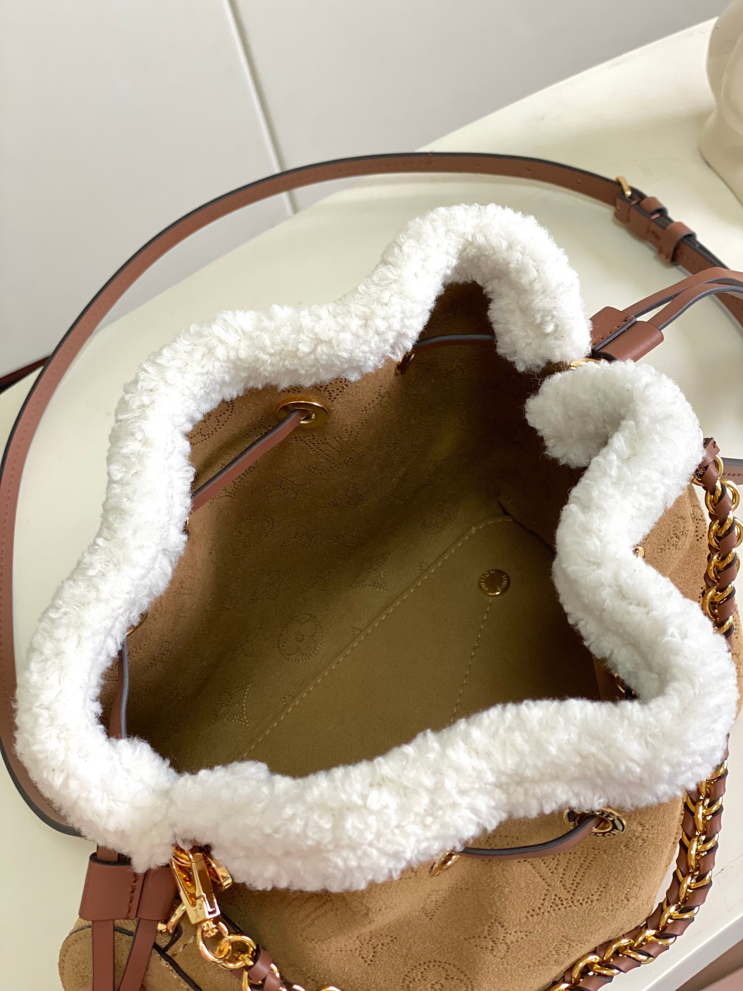Louis Vuitton Bella Bucket Crossbody Bag from the LV Ski Collection - Image 9