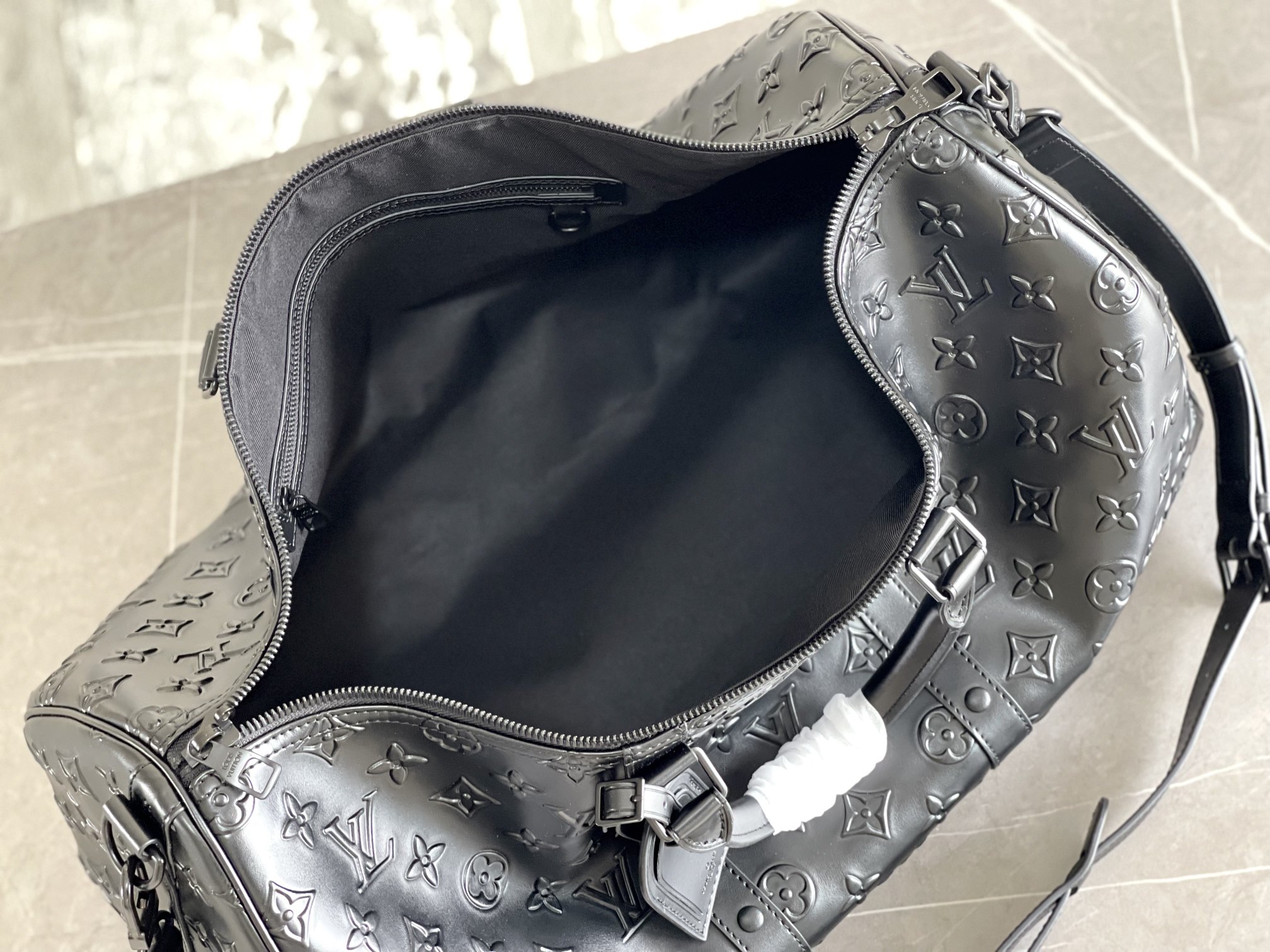 Keepall Bandoulière Travel Bag in Monogram Seal - Image 9