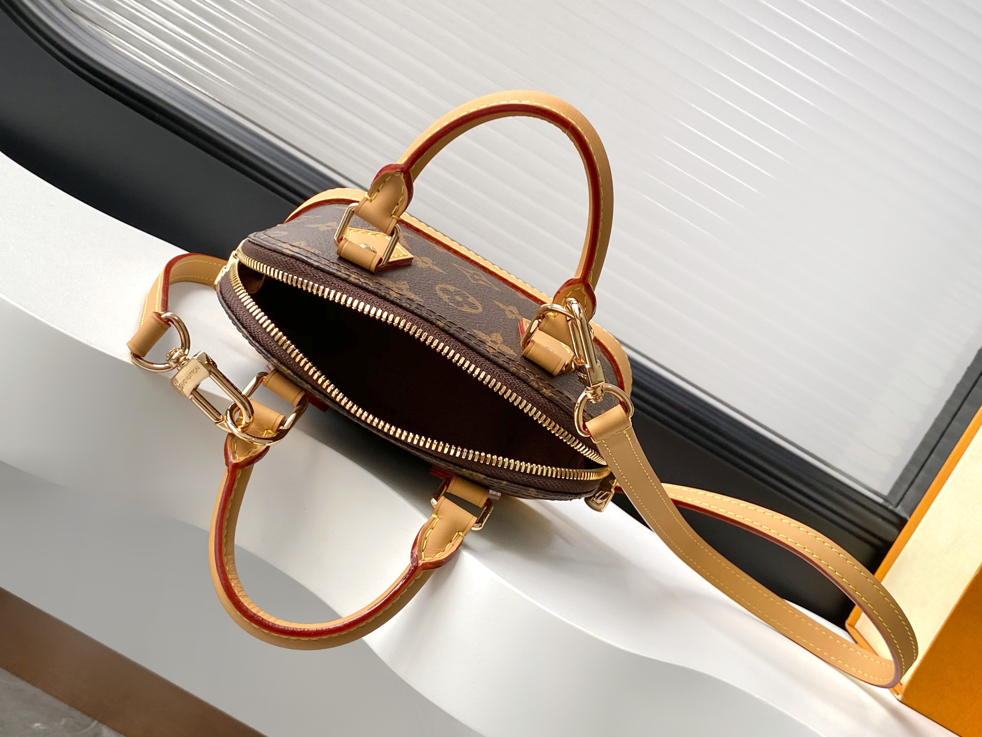 Louis Vuitton Nano Alma Handbag in Monogram Dune Canvas - Image 9
