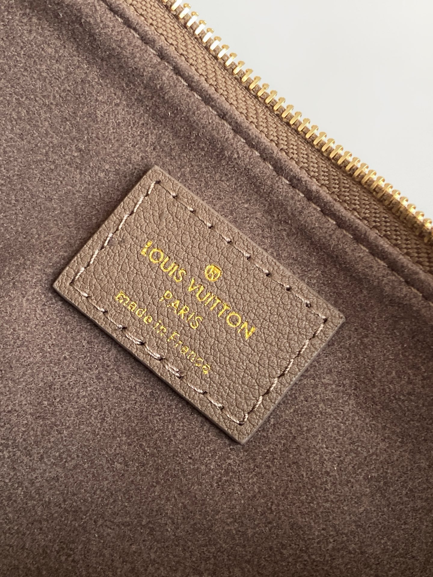 Louis Vuitton Liv Pochette in Monogram Empreinte Leather - Image 9