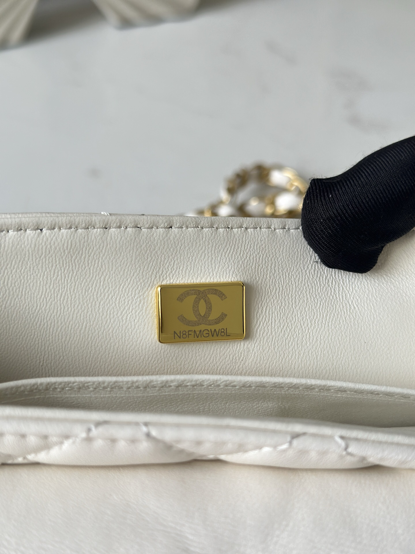 Kelly-Style Handbag in Black and Gold - Image 9