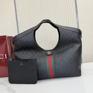 Gucci Perforated Leather Luggage