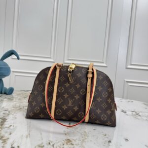 Squire Shoulder Bag in Monogram Canvas