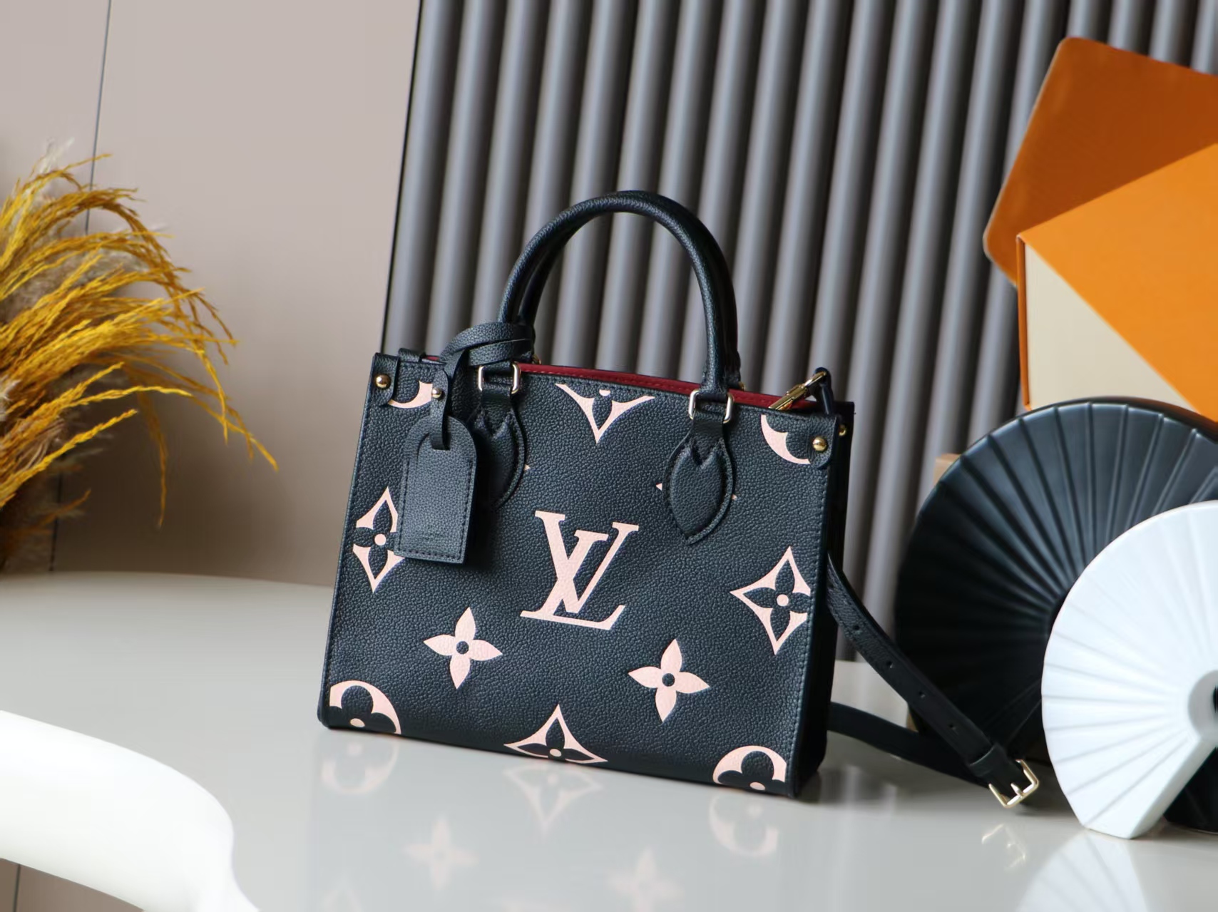 Louis Vuitton OnTheGo Tote Bag in Monogram-Embossed Cowhide Leather