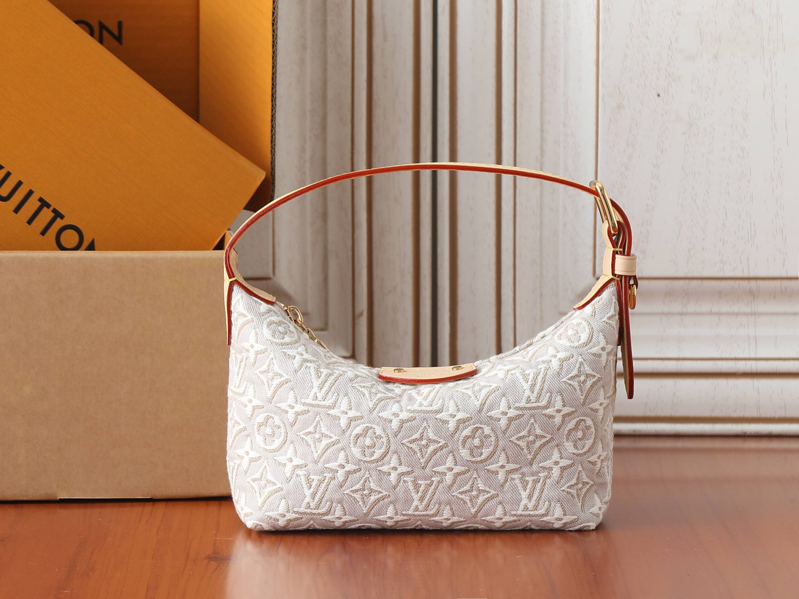 Louis Vuitton Pochette Hills Handbag