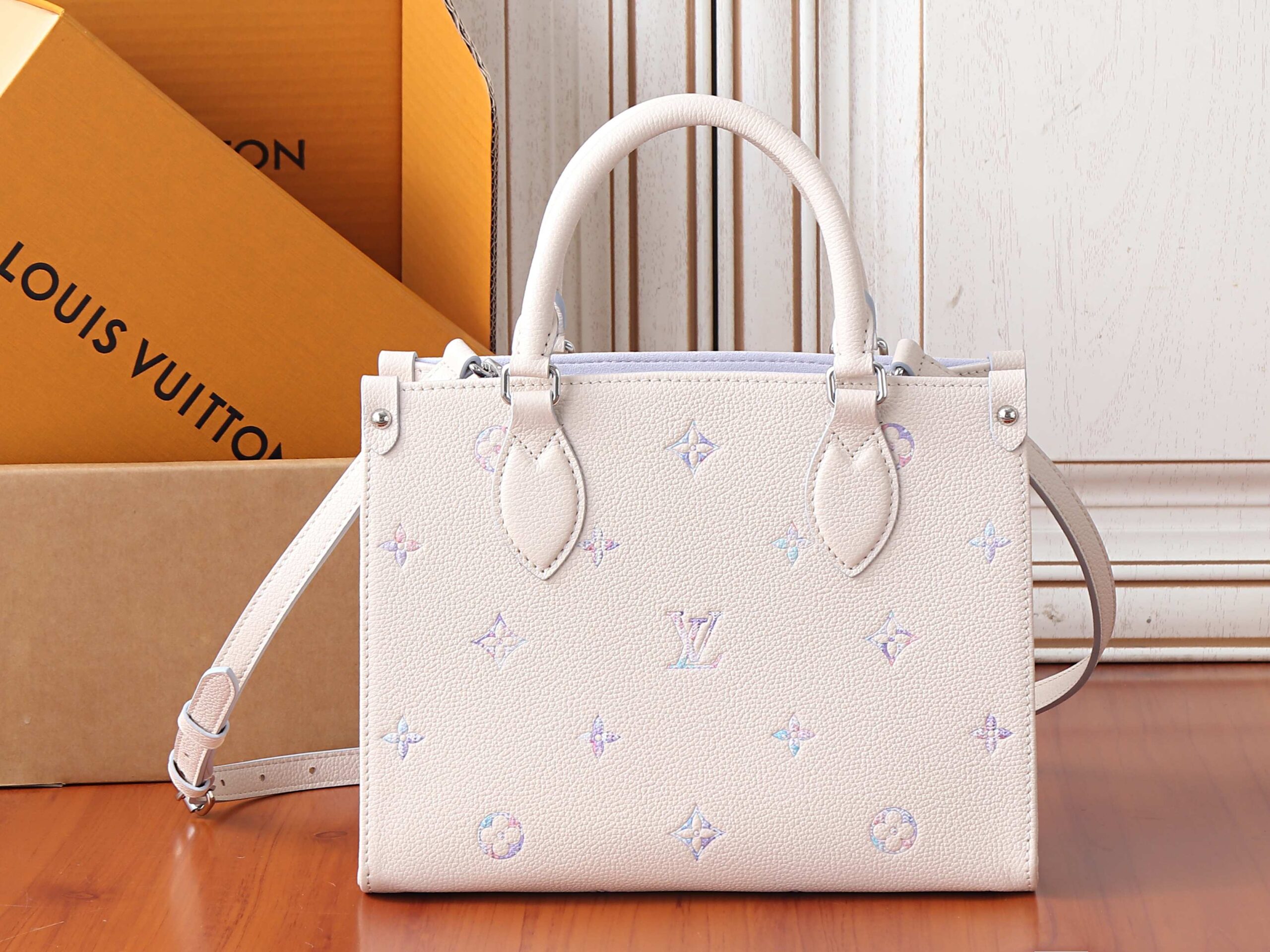 Louis Vuitton OnTheGo Small Handbag in Monogram Empreinte Leather