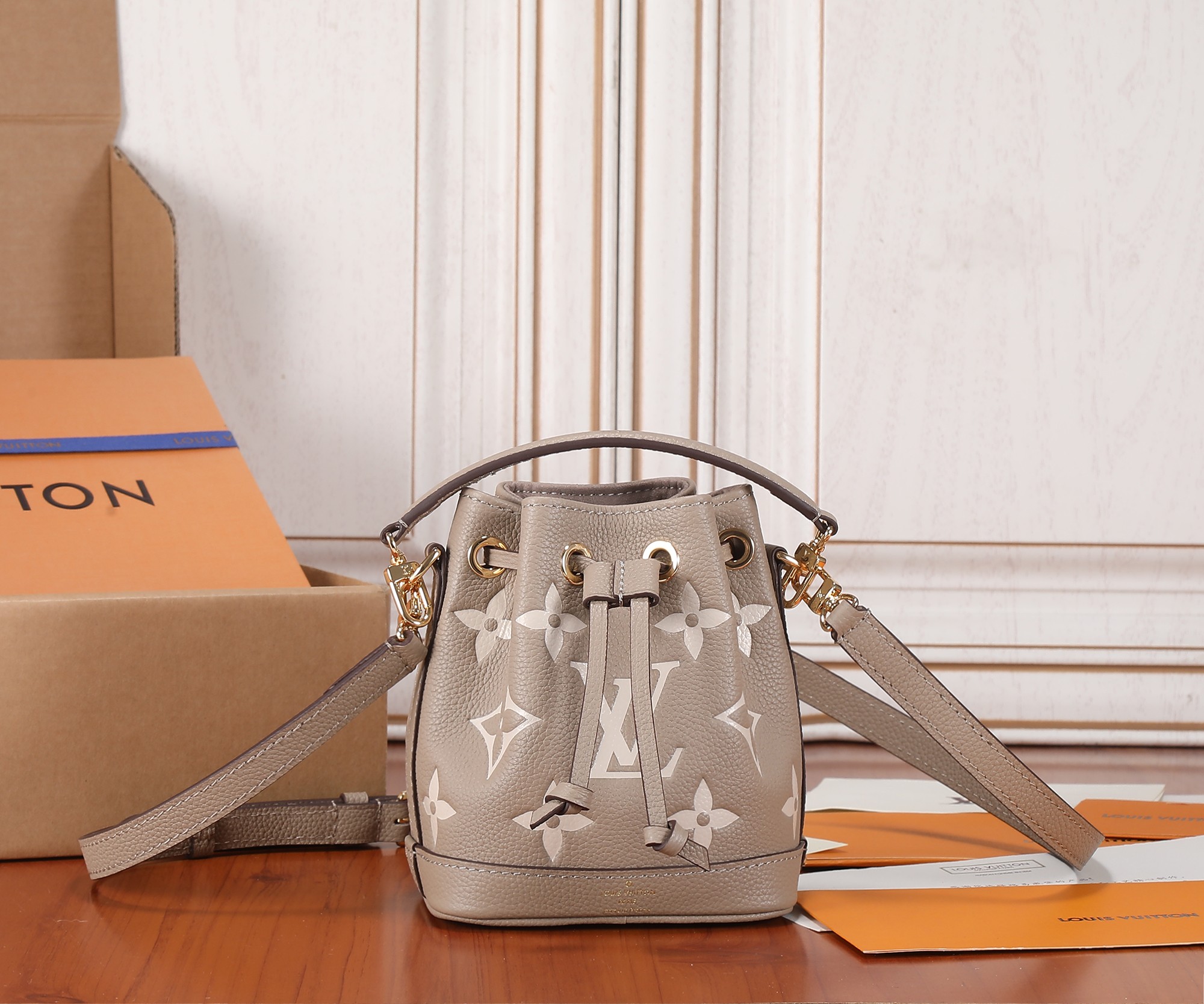 Louis Vuitton Nano Noé Monogram Empreinte Leather Crossbody Bag