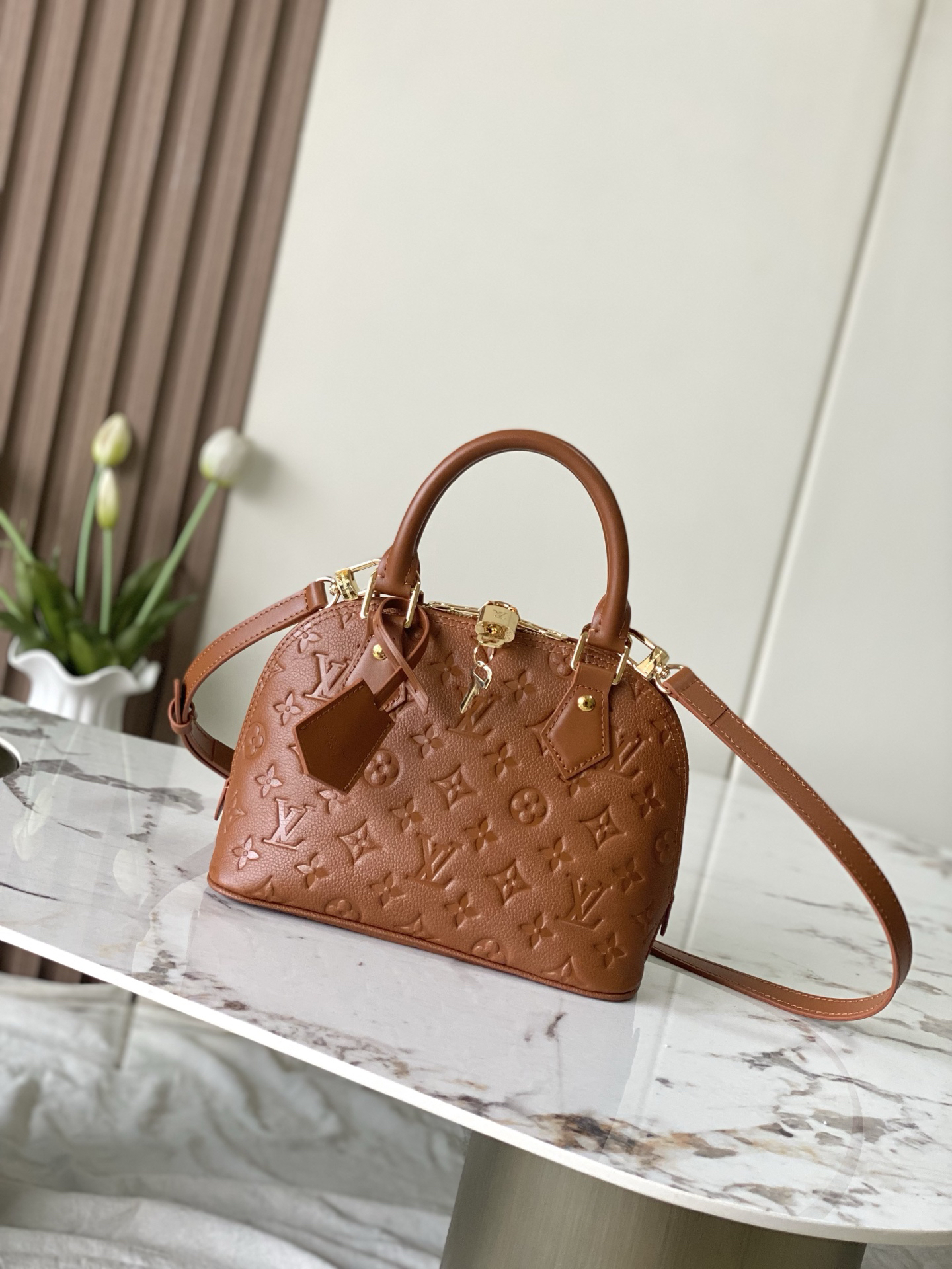 Louis Vuitton Alma BB Handbag in Brown Monogram Empreinte Leather