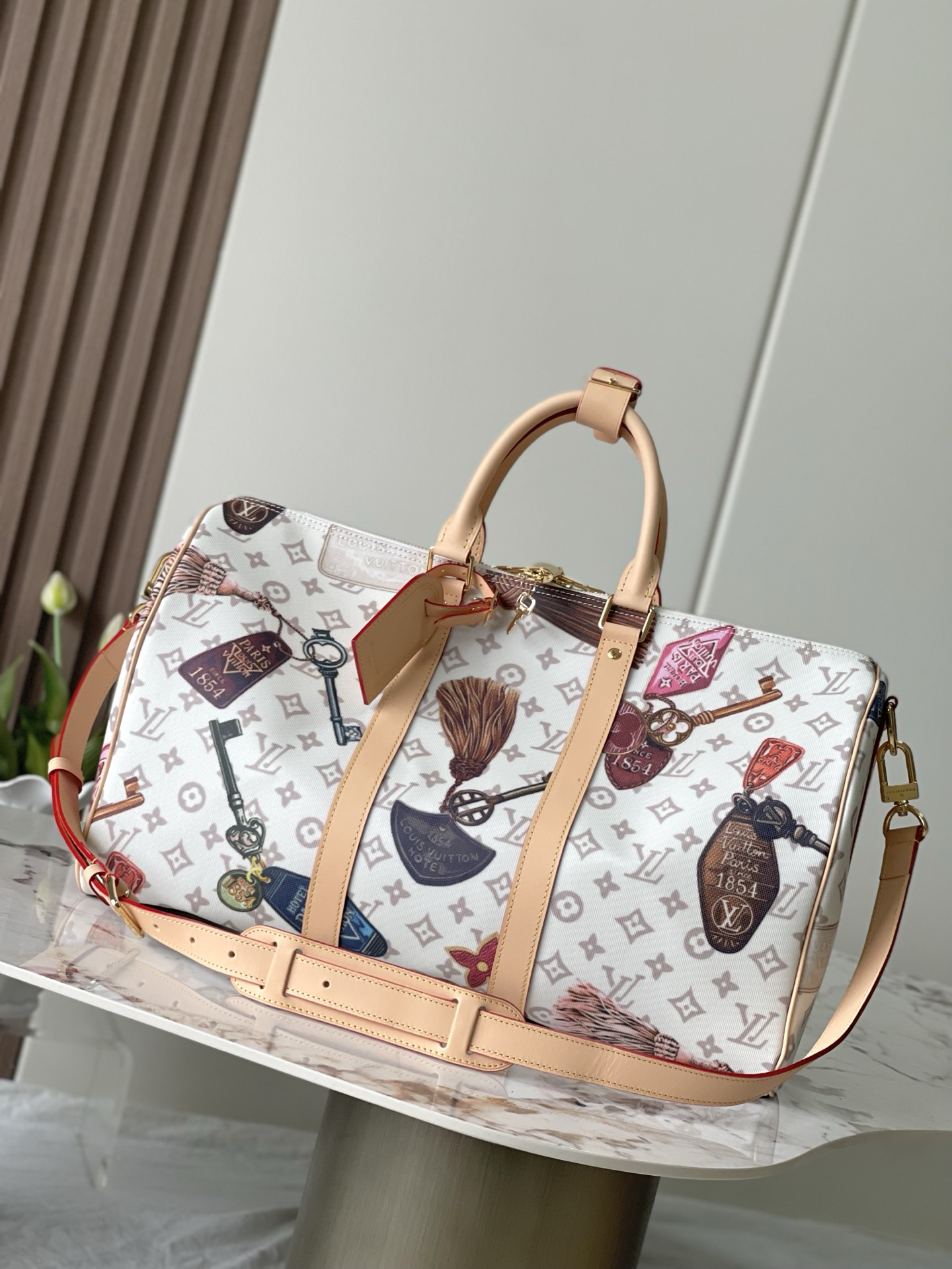 Keepall Bandoulière 45 Travel Bag in Monogram Dune Canvas