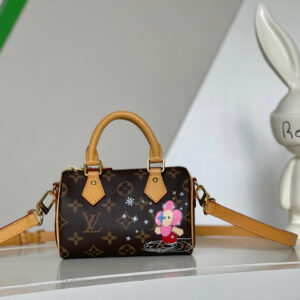 Louis Vuitton Nano Speedy Handbag in Monogram Canvas and Pink Leather