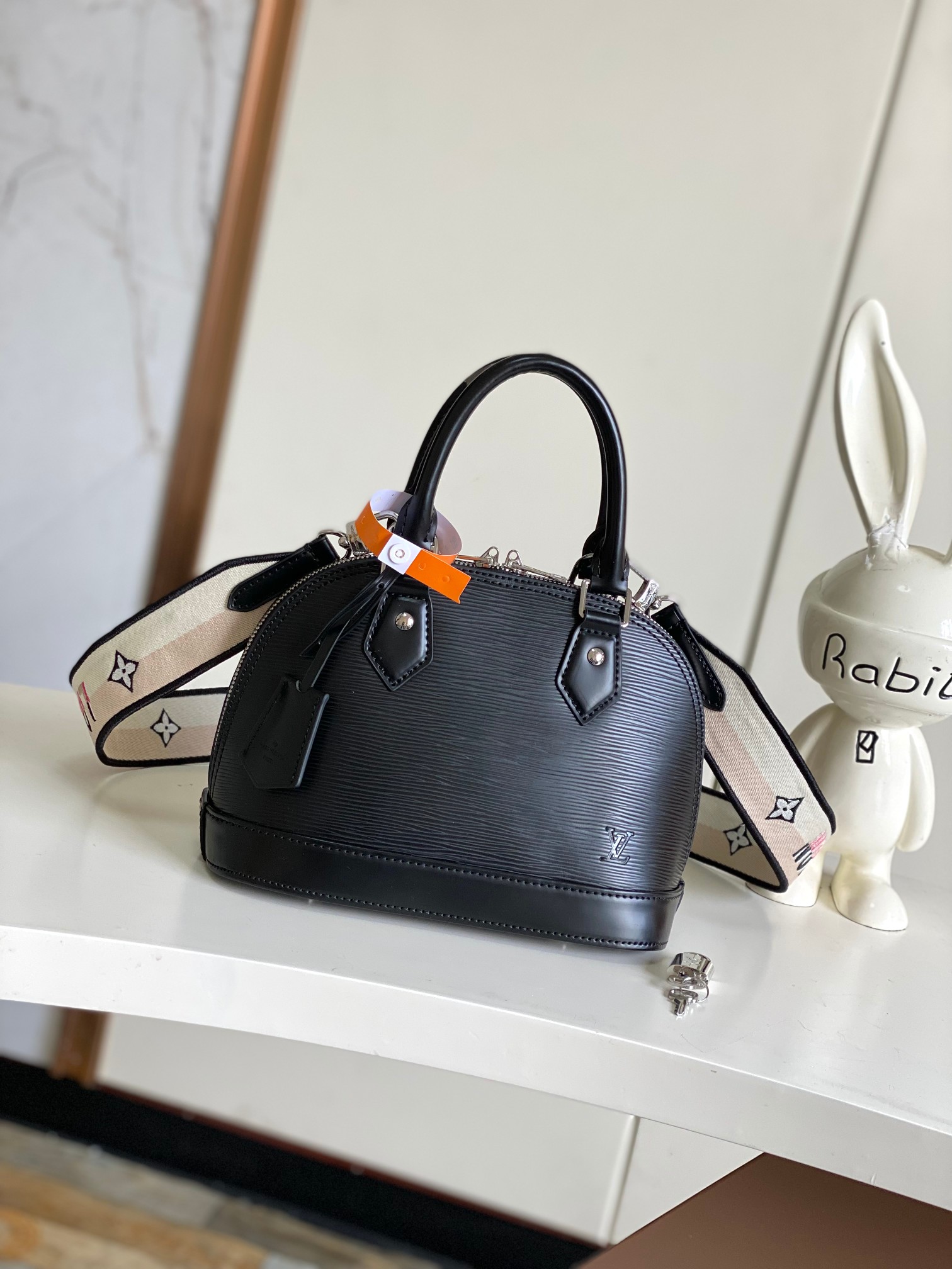 Louis Vuitton Alma BB Epi Leather Handbag