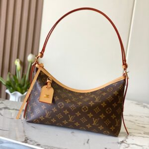 Louis Vuitton CarryAll EastWest Handbag in Monogram Canvas and Leather