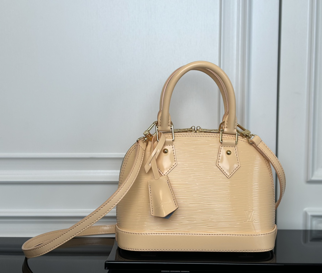 Louis Vuitton Alma BB Epi Leather Crossbody Bag in Almond