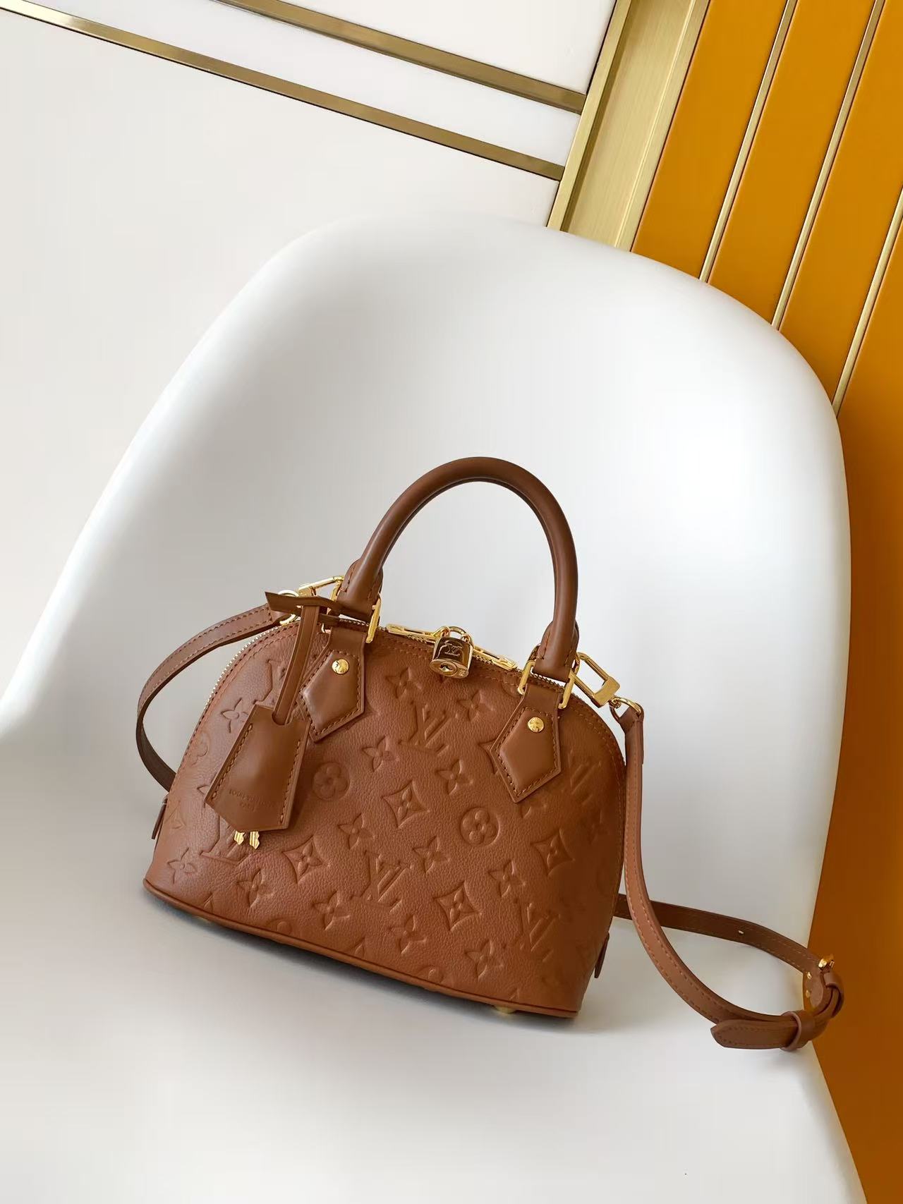 Louis Vuitton Alma BB Handbag in Monogram Empreinte Leather