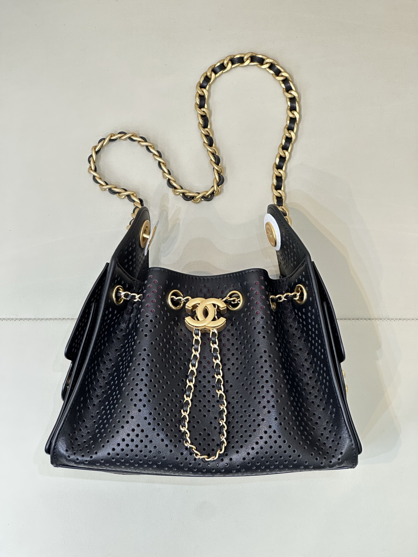 Chanel 25 Perforated Cowhide Bucket Handbag