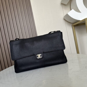 Chanel Maxi Flap Handbag in Black with Gold-Tone Hardware