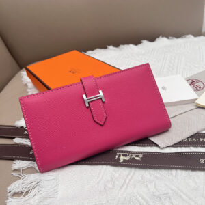 Hermès Leather Vertical Wallet with Interior Zip Pocket
