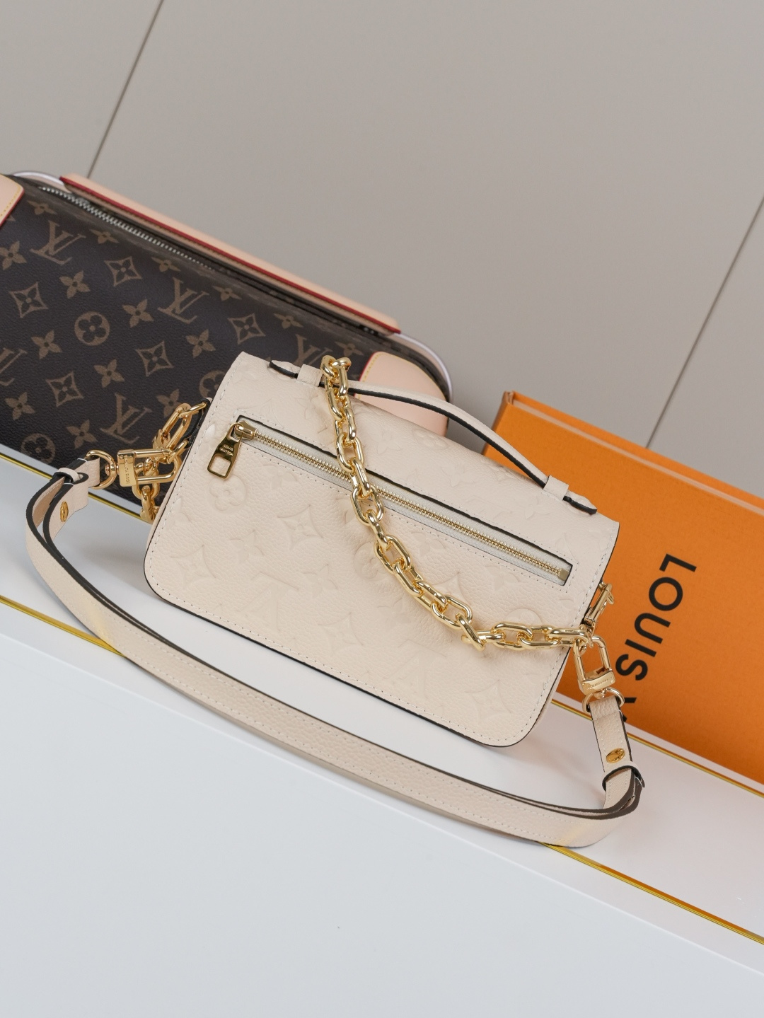 Pochette Métis East West Bag in Cream Monogram Empreinte Leather - Image 2