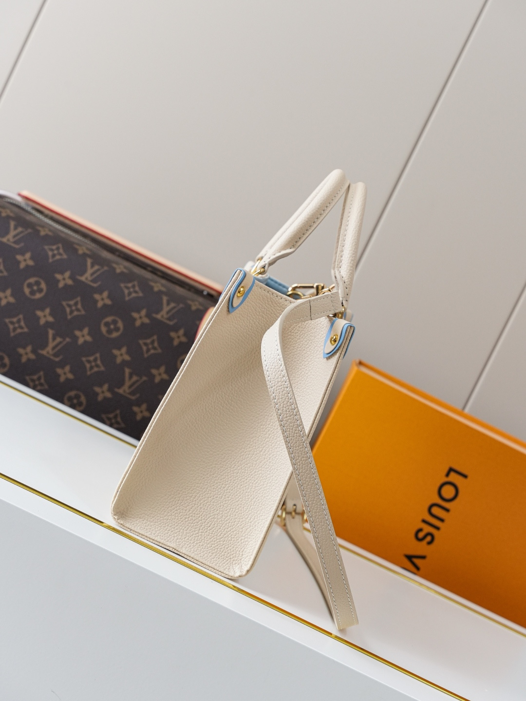 Louis Vuitton OnTheGo Small Tote Bag in Bicolor Monogram Empreinte Leather - Image 2