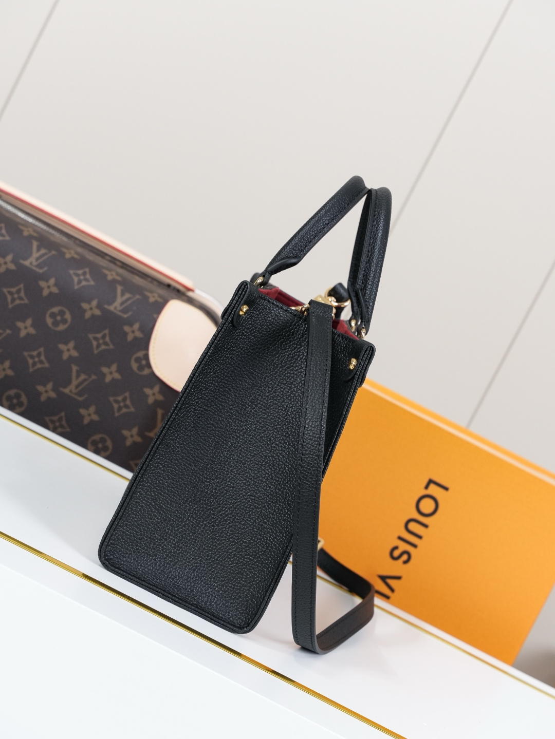Louis Vuitton OnTheGo Small Tote Bag in Monogram Empreinte Leather - Image 2