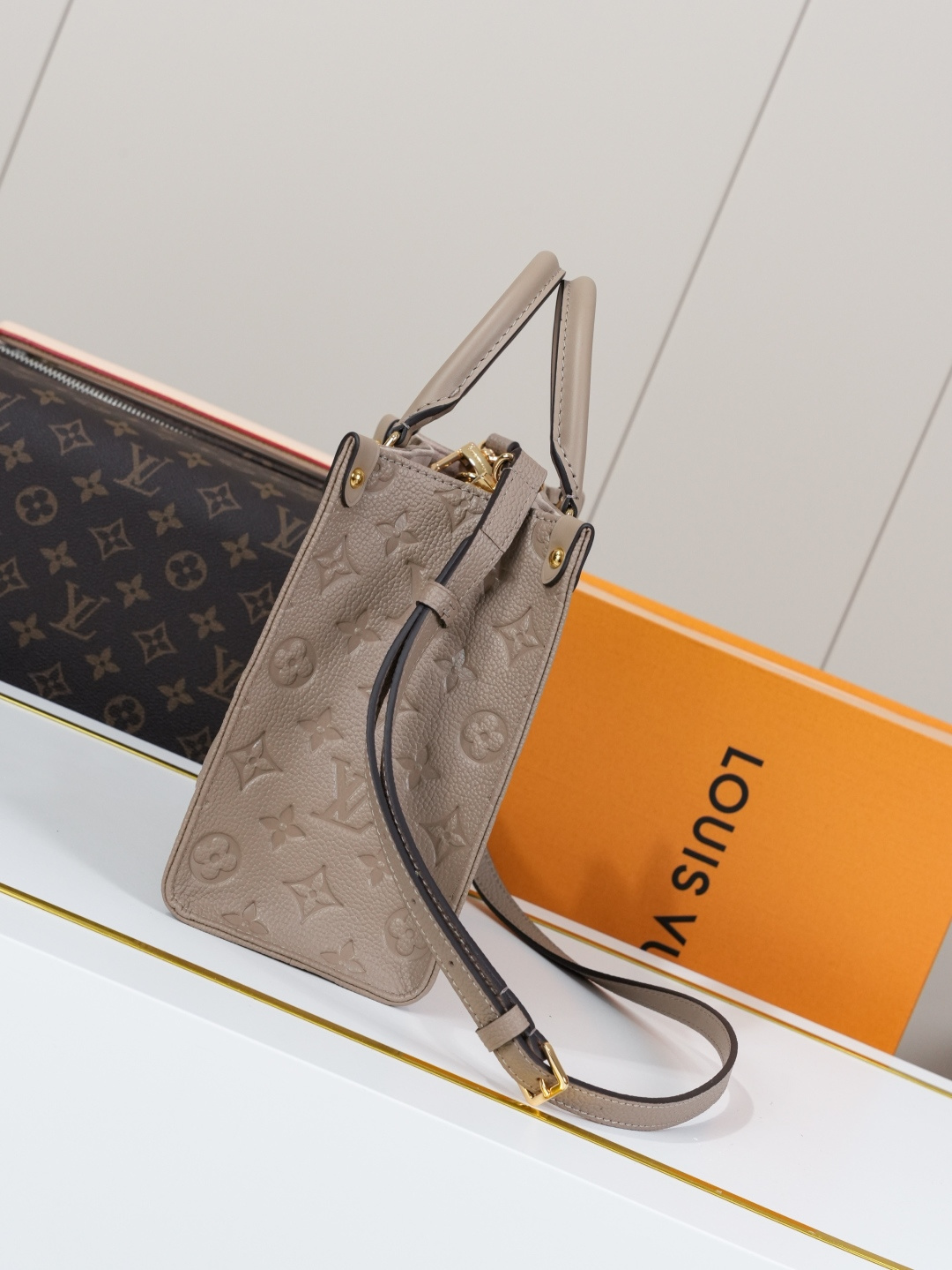 Louis Vuitton Onthego Small Tote Bag in Monogram Empreinte Leather - Image 2