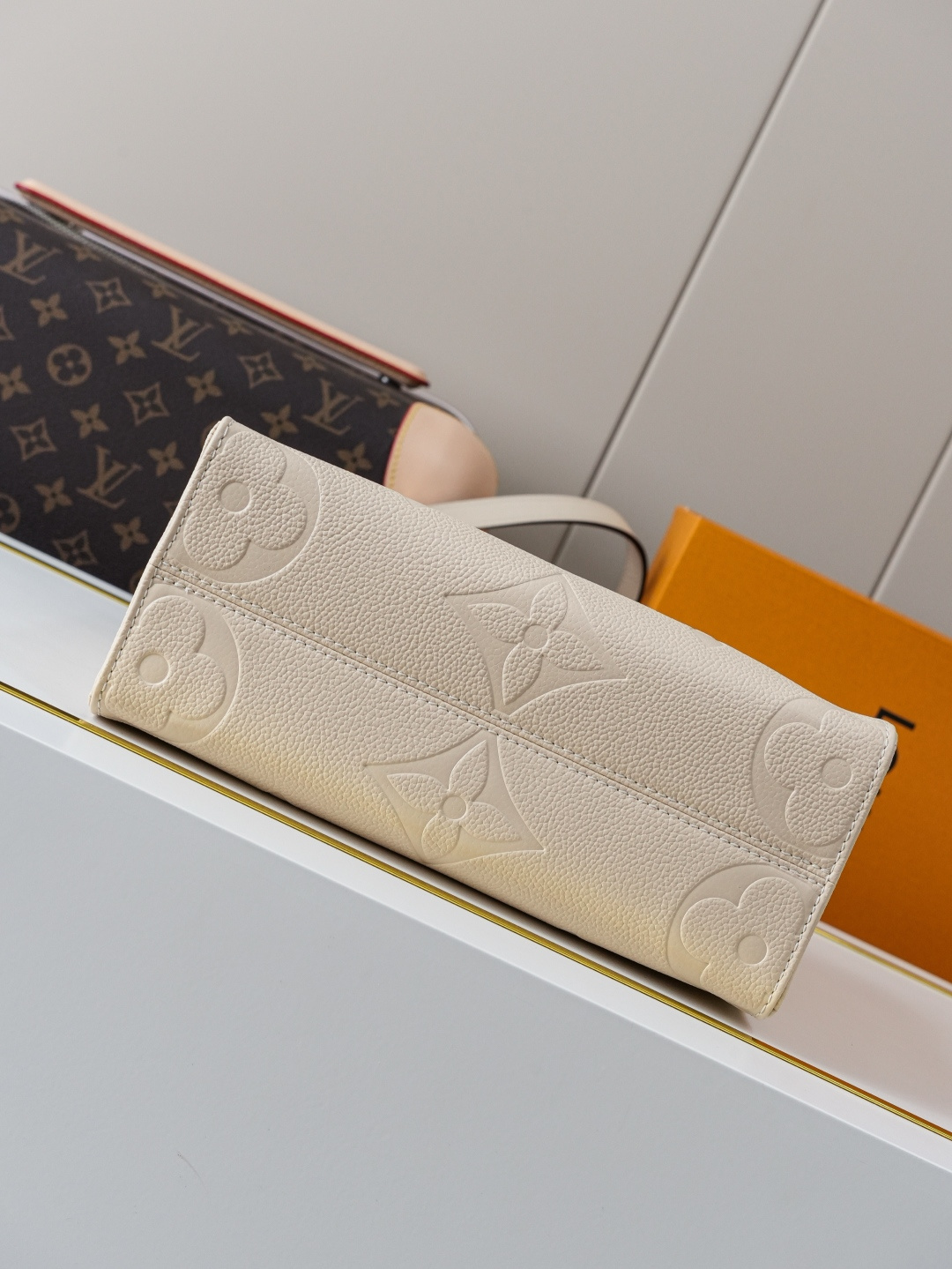 Louis Vuitton OnTheGo Small Handbag in Cream Monogram Empreinte Leather - Image 2
