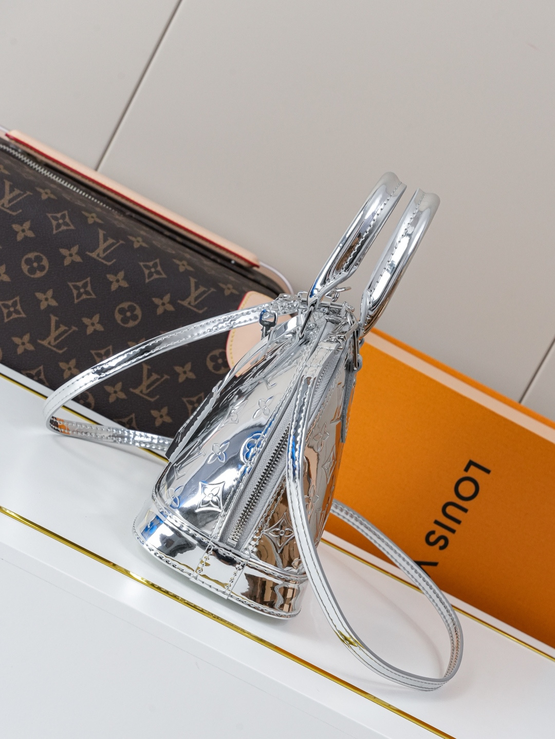 Louis Vuitton Alma BB Handbag in Silver Monogram Miroir Canvas - Image 2