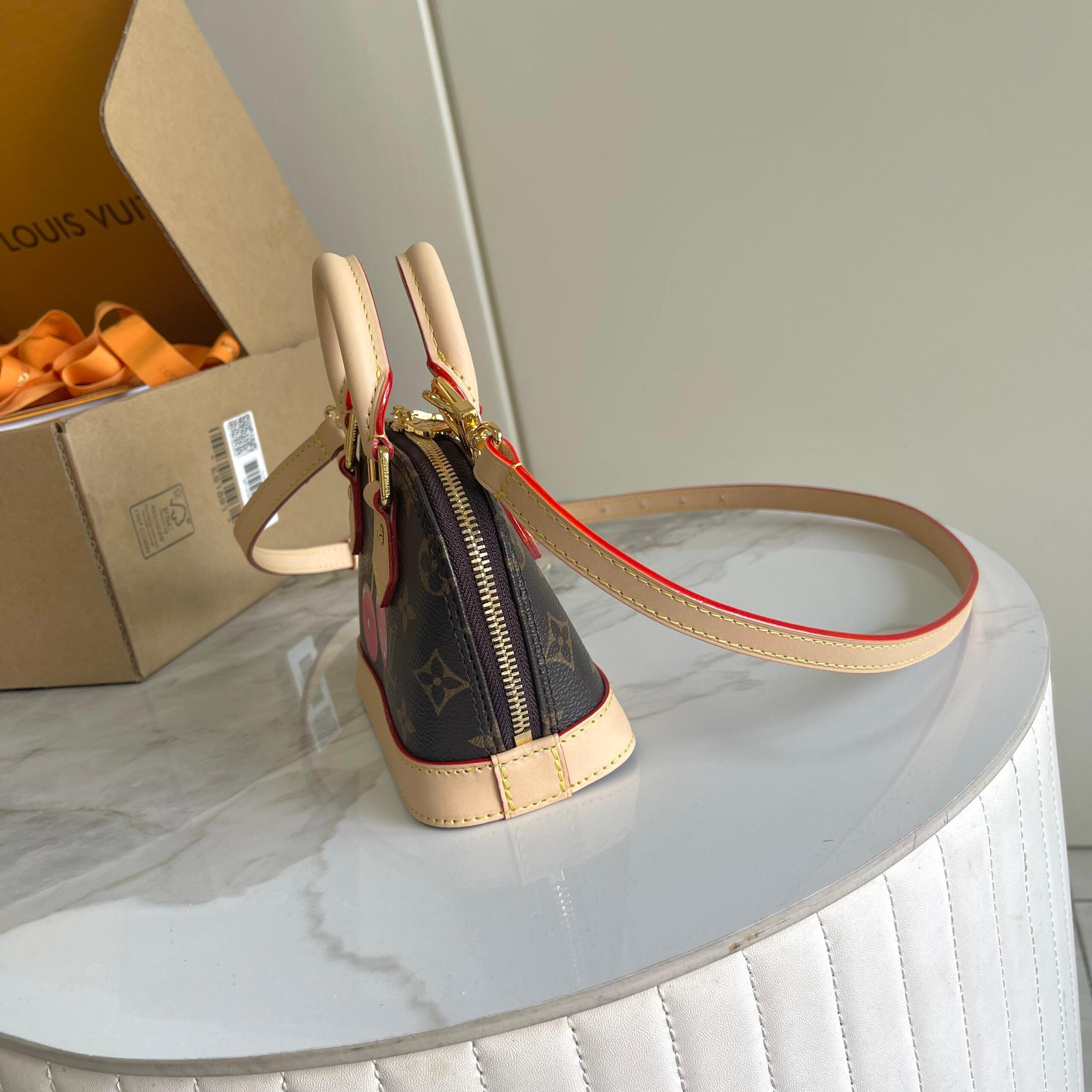 Louis Vuitton Nano Alma Cherry Monogram Handbag - Image 2