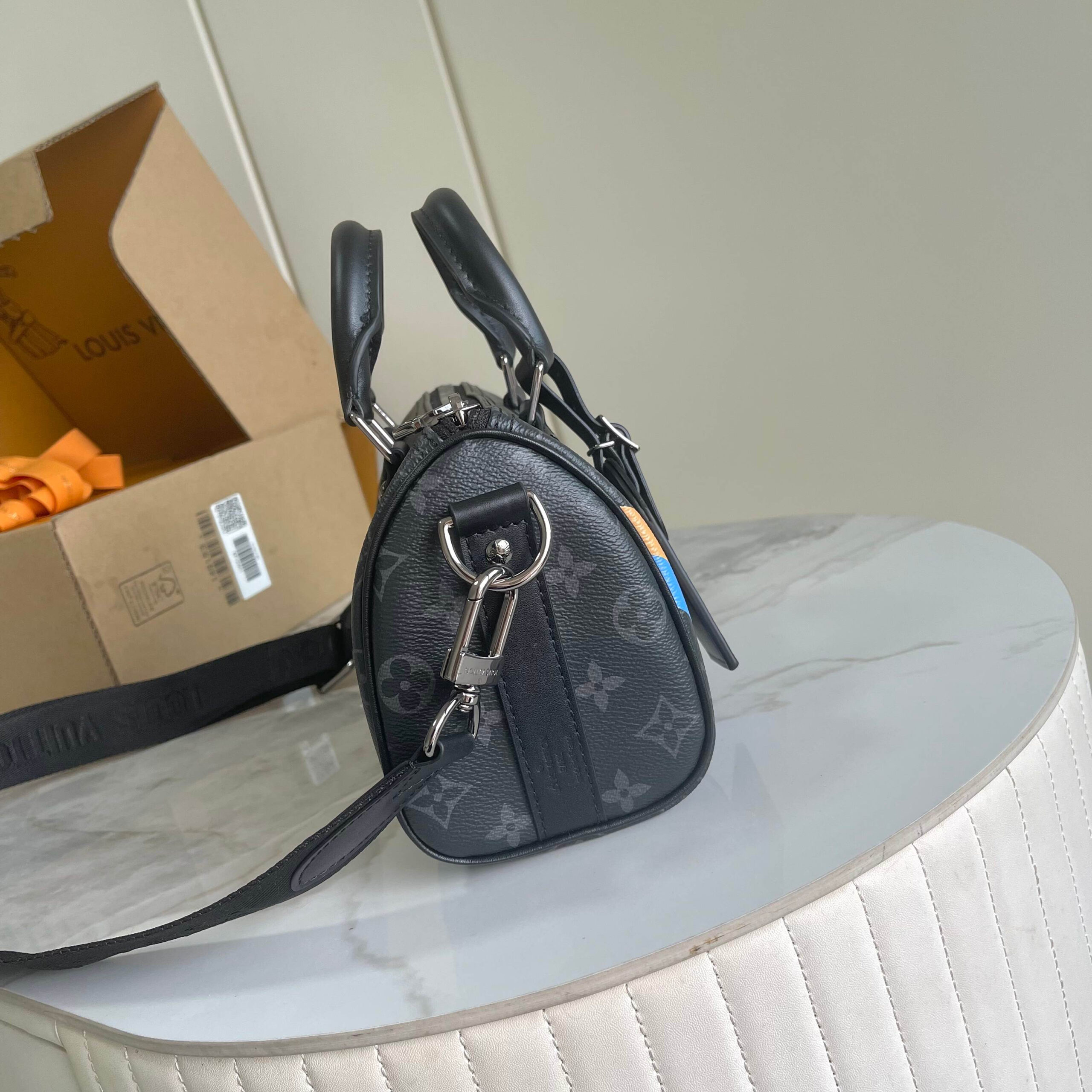 Louis Vuitton Keepall 25 Handbag in Monogram Eclipse Reverse Canvas - Image 2