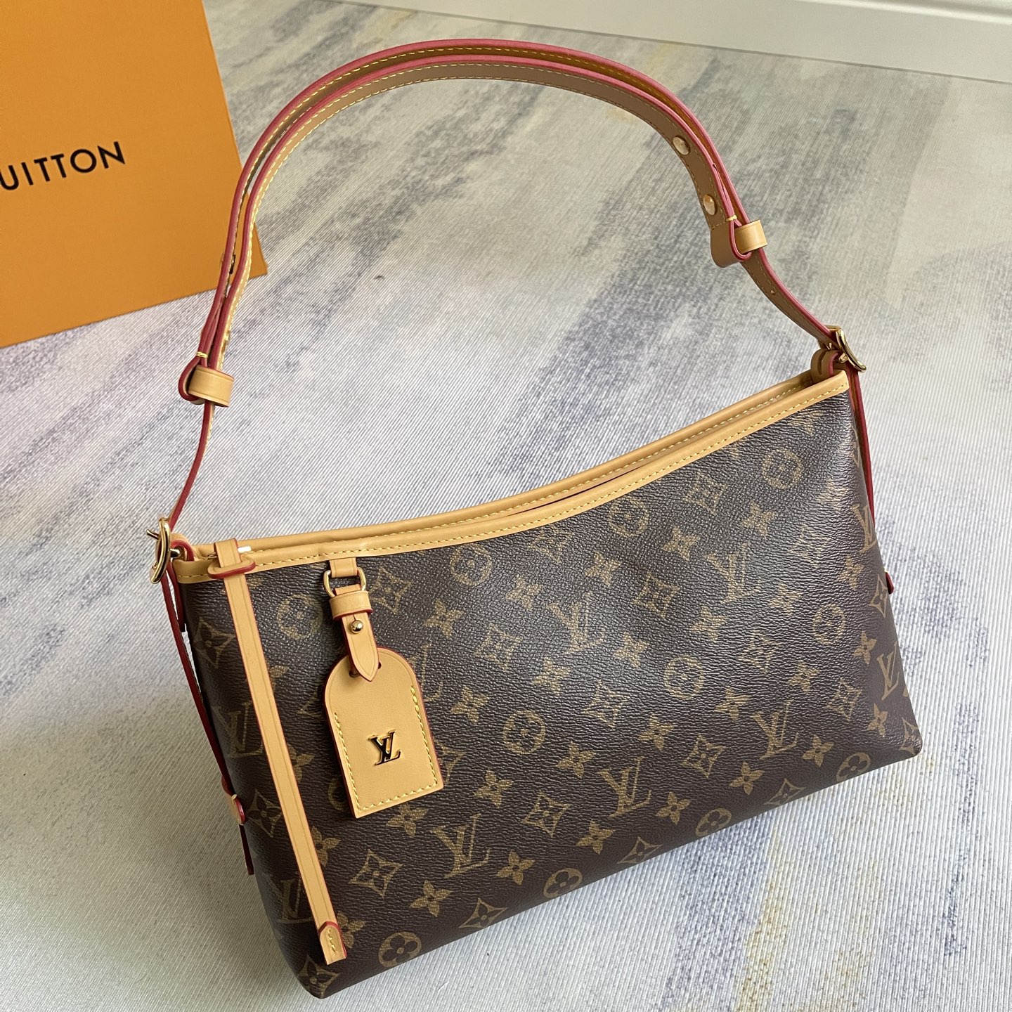 CarryAll East West Handbag in Monogram Canvas and Leather Trim - Image 2