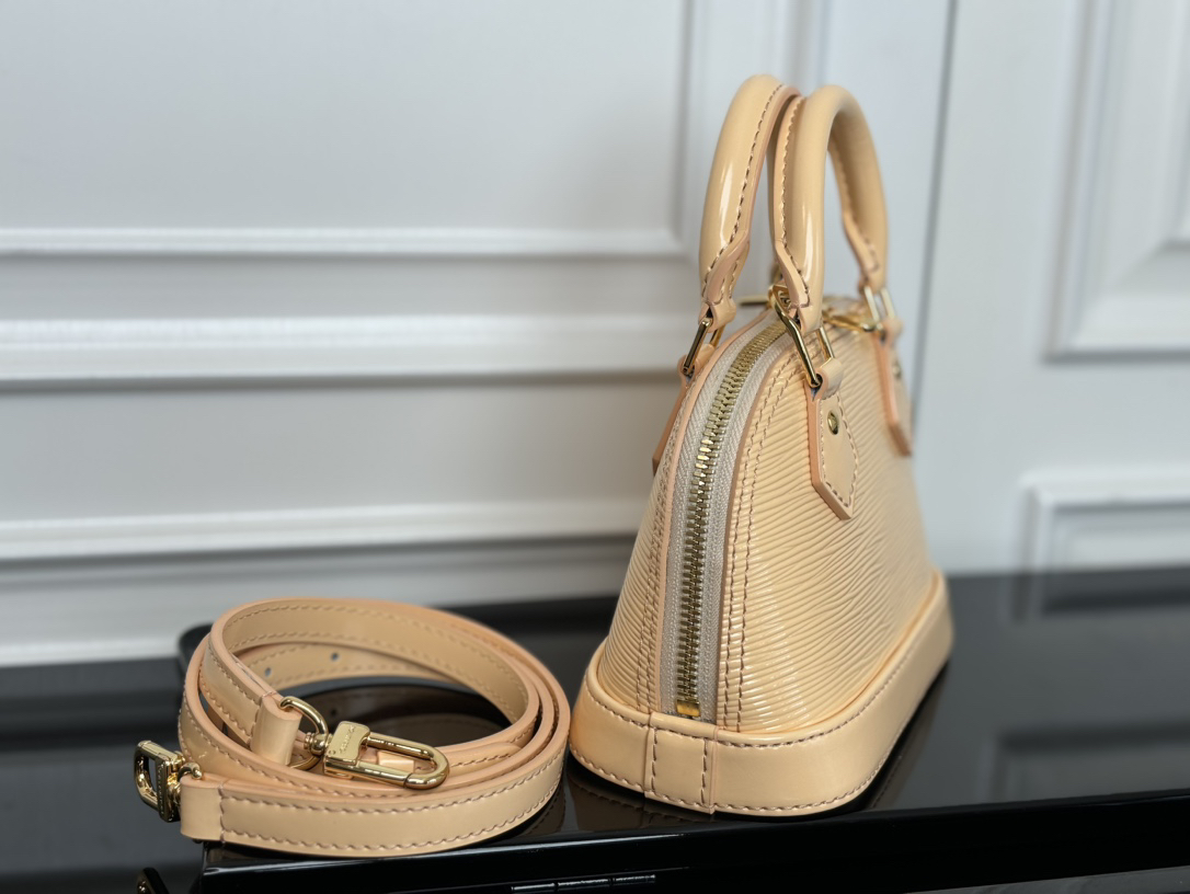 Louis Vuitton Nano Alma Epi Leather Crossbody Bag in Almond - Image 2
