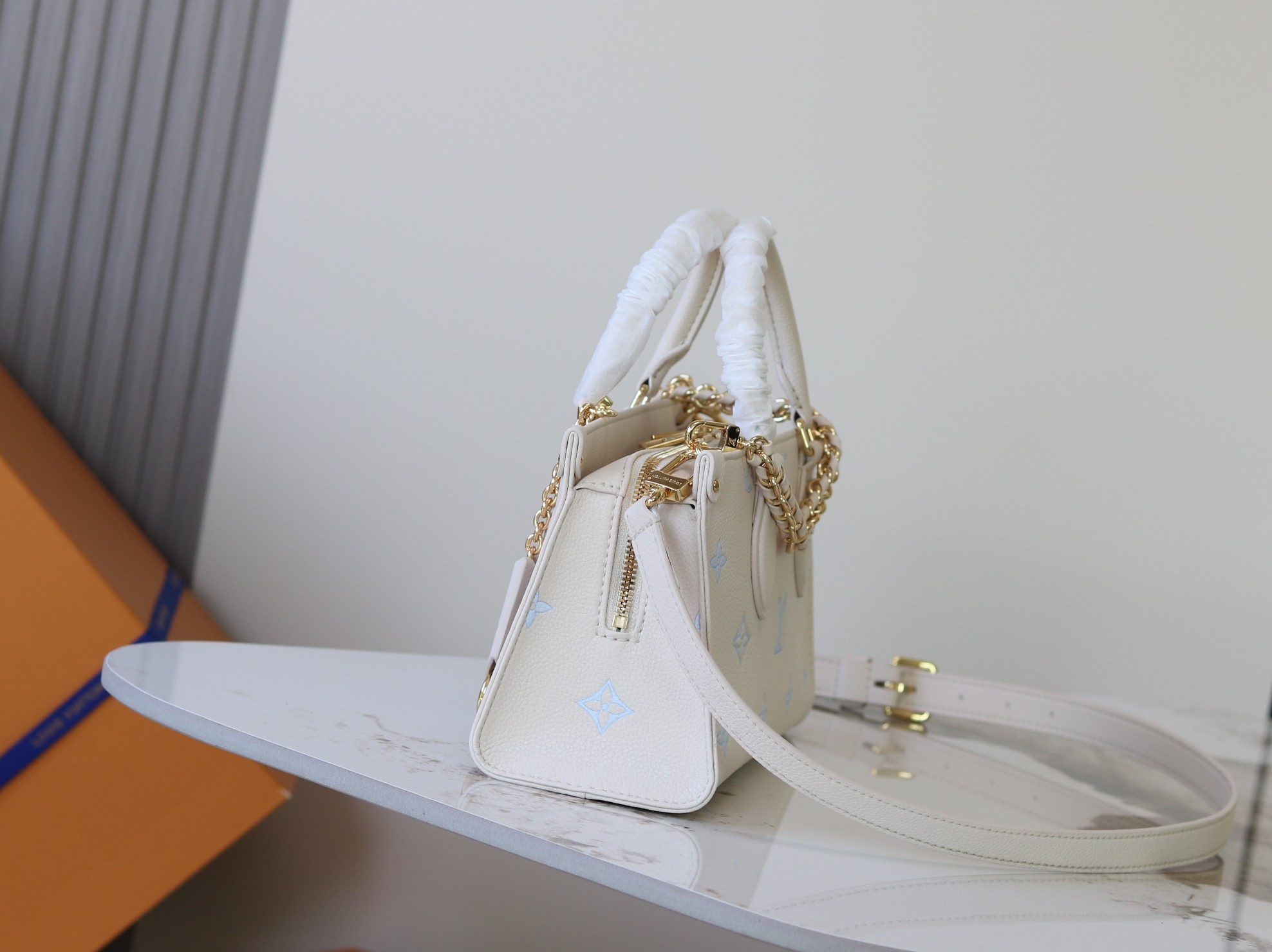 Louis Vuitton OnTheGo EW Handbag in Blue Monogram Empreinte Leather - Image 2