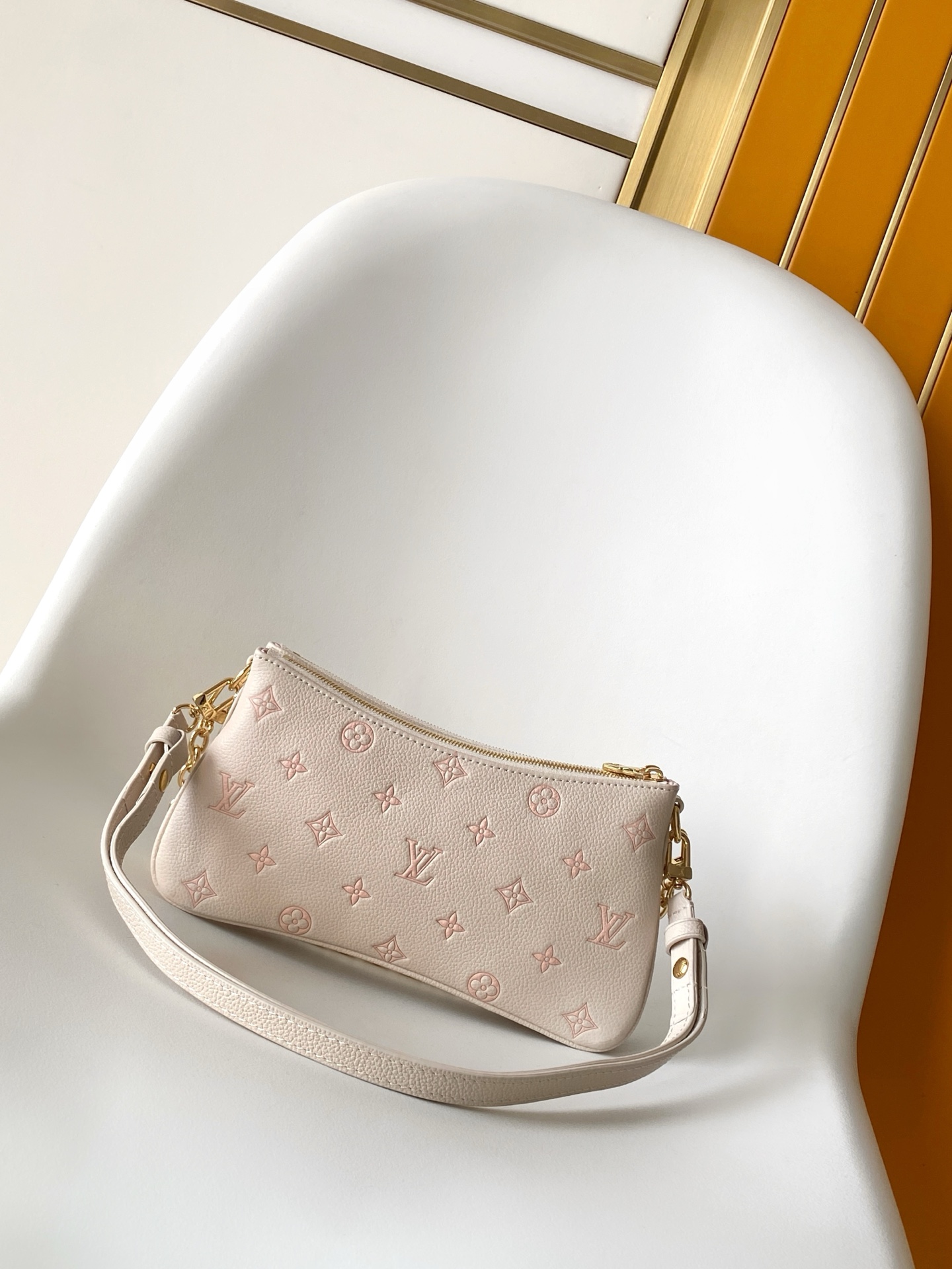 Louis Vuitton Liv Pochette in Monogram Empreinte Leather - Image 2