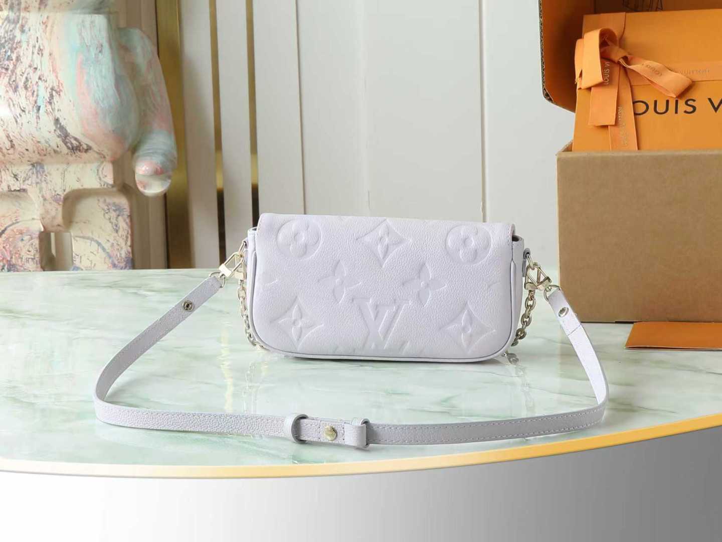 Louis Vuitton Wallet on Chain Ivy in Purple Monogram Empreinte Leather - Image 3