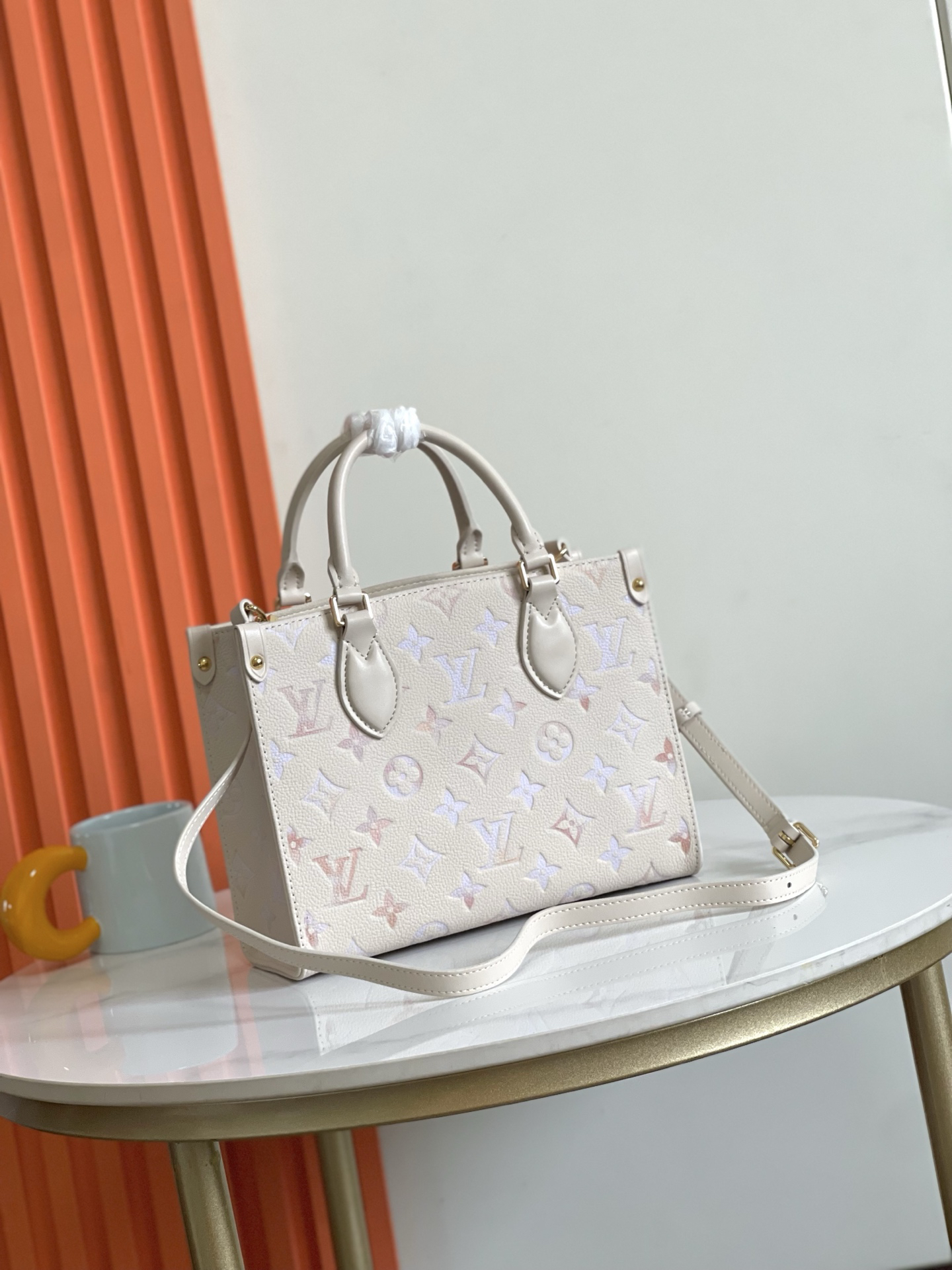 Louis Vuitton OnTheGo Small Crossbody Bag in Monogram Empreinte Leather - Image 3