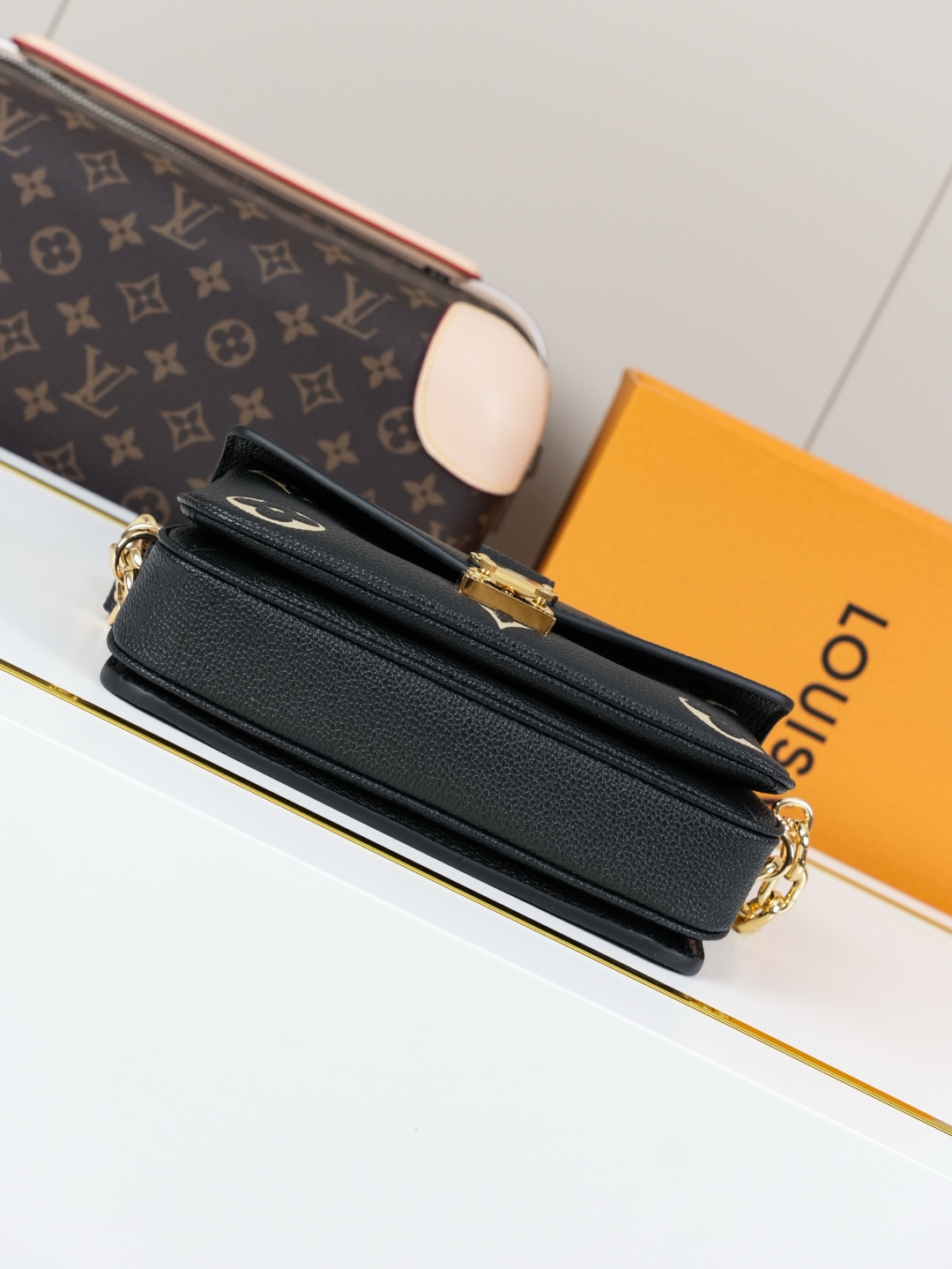 Pochette Métis East West Bag in Monogram Empreinte Leather - Image 3