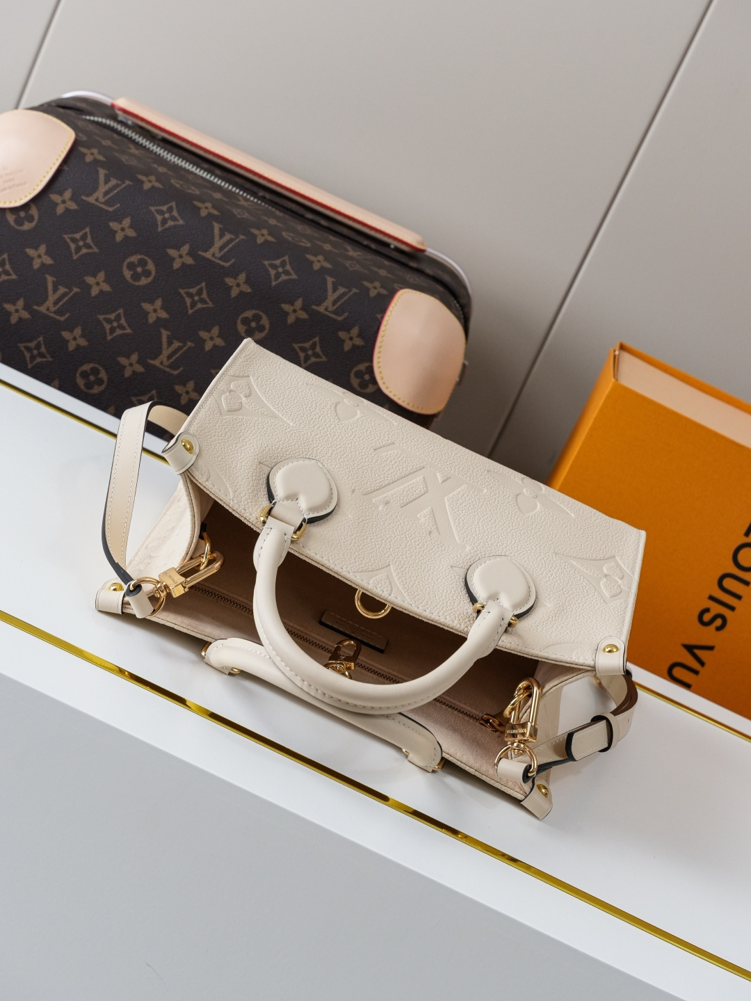 Louis Vuitton OnTheGo Small Handbag in Cream Monogram Empreinte Leather - Image 3