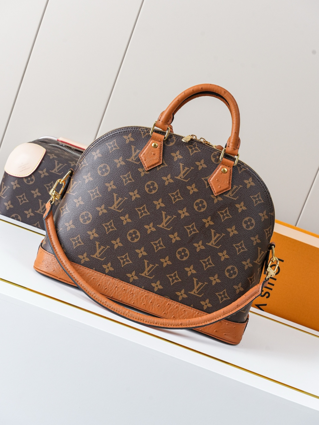 Louis Vuitton Alma Medium Handbag in Monogram Canvas with Ostrich Leather Trim - Image 3