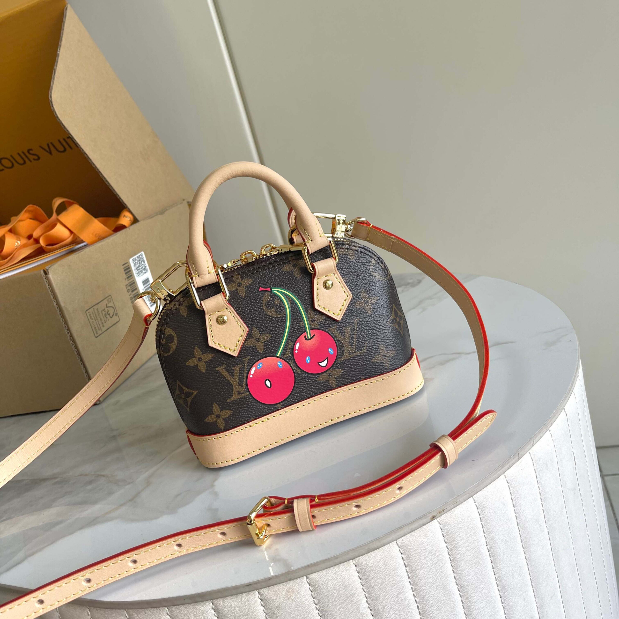 Louis Vuitton Nano Alma Cherry Monogram Handbag - Image 3