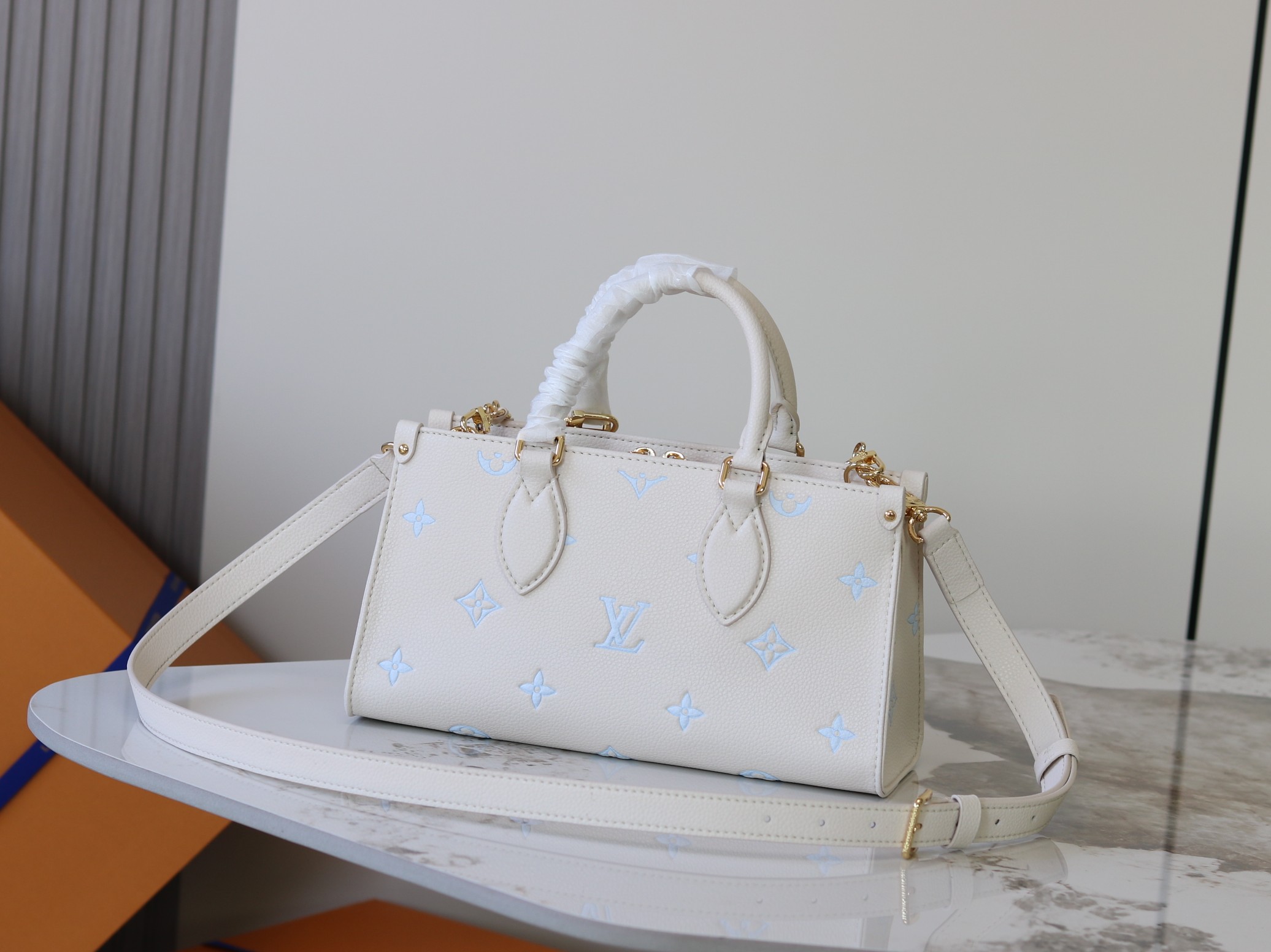 Louis Vuitton OnTheGo EW Handbag in Blue Monogram Empreinte Leather - Image 3
