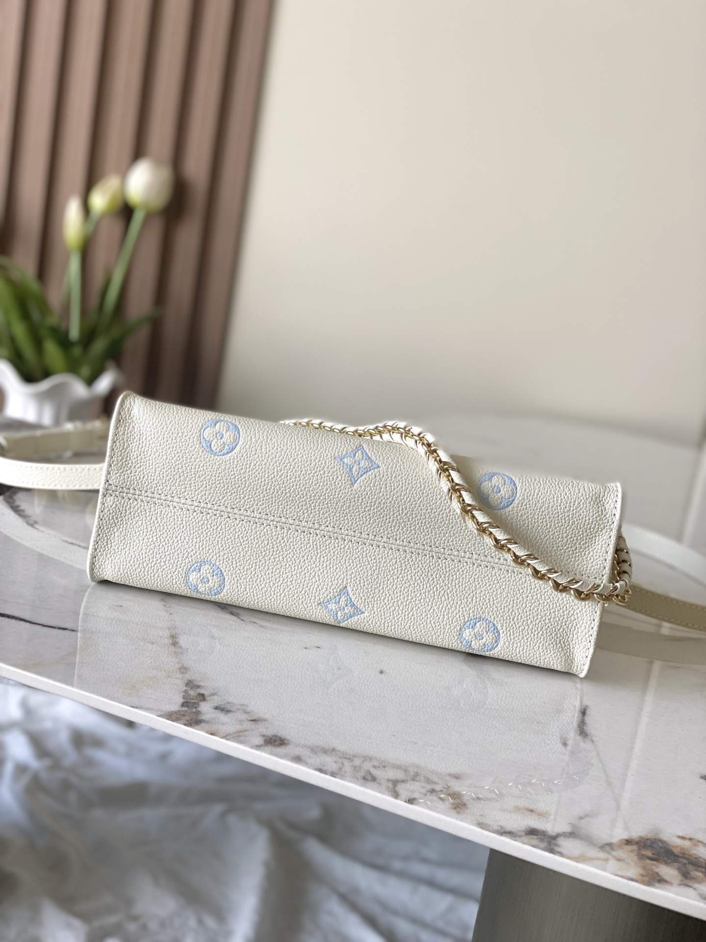 Louis Vuitton OnTheGo EW Monogram Empreinte Leather Tote Bag in Sea Salt Blue - Image 4