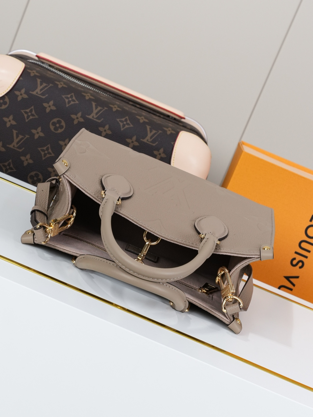 Louis Vuitton Onthego Small Tote Bag in Monogram Empreinte Leather - Image 4