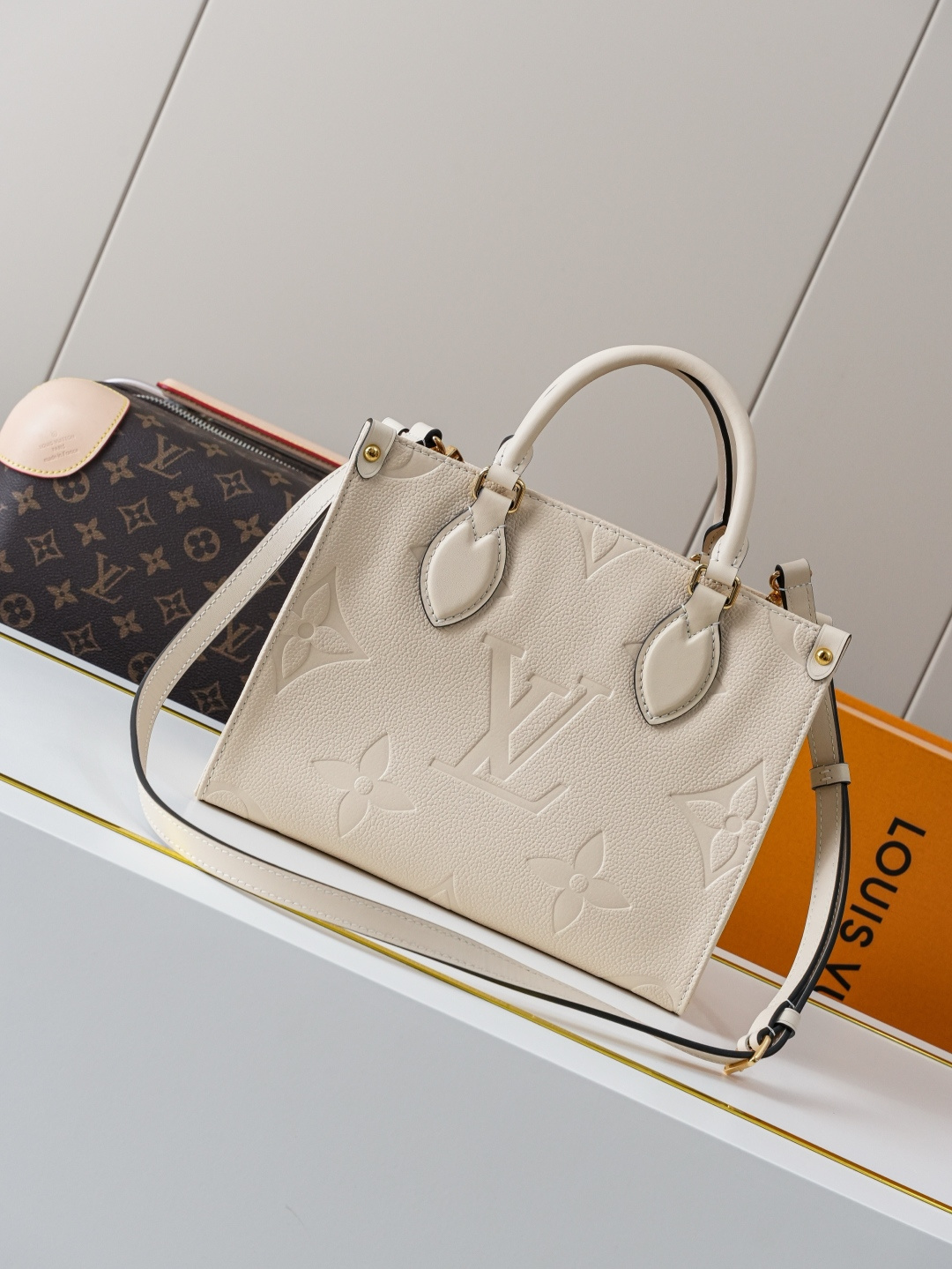 Louis Vuitton OnTheGo Small Handbag in Cream Monogram Empreinte Leather - Image 4