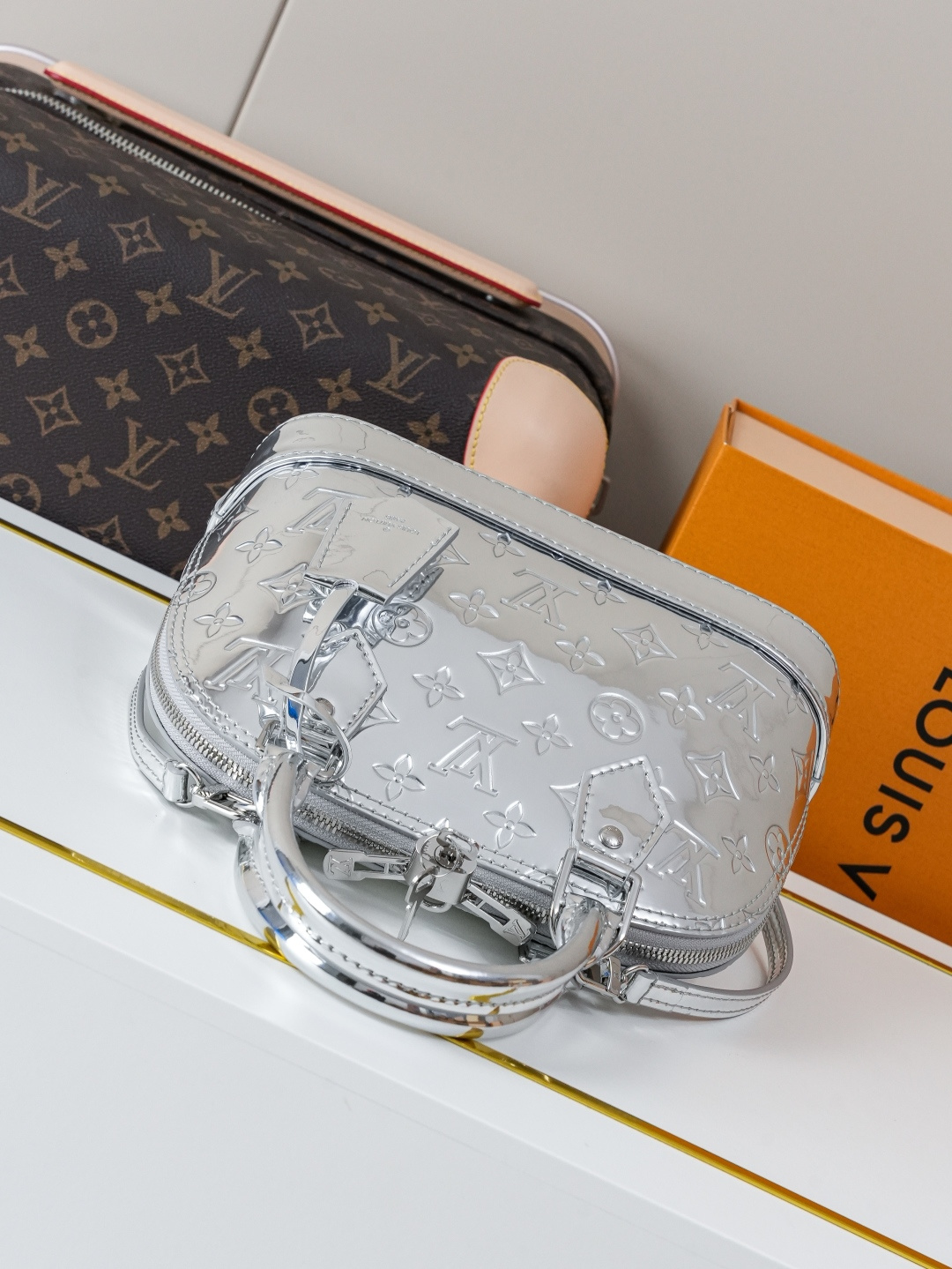 Louis Vuitton Alma BB Handbag in Silver Monogram Miroir Canvas - Image 4