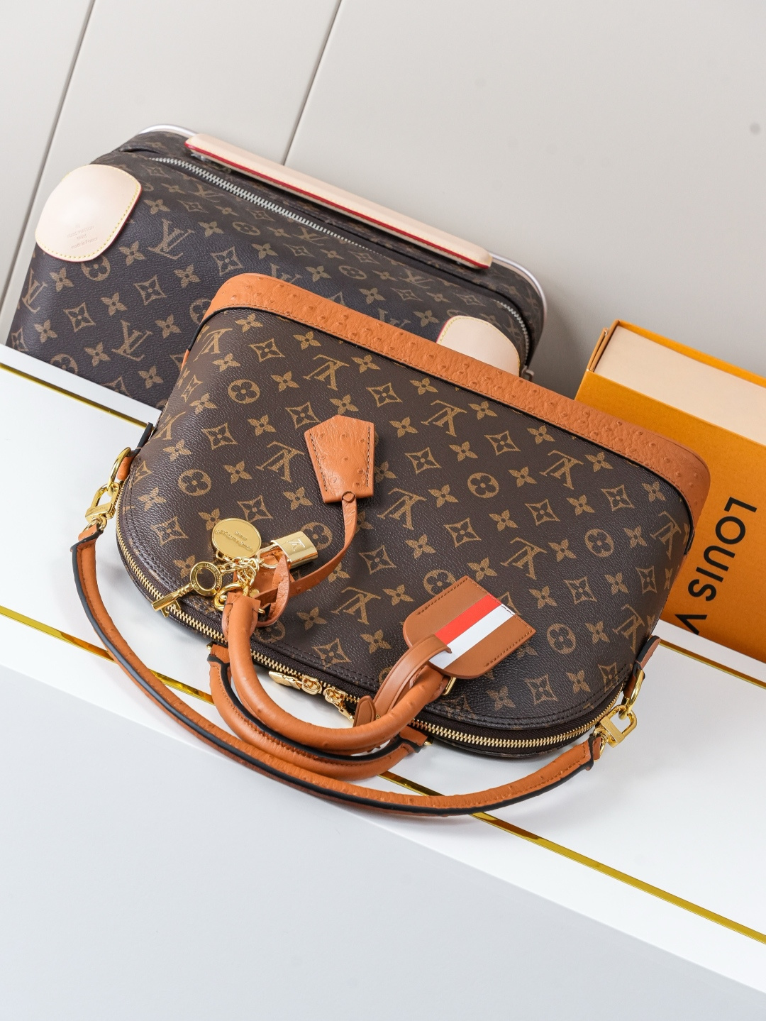 Louis Vuitton Alma Medium Handbag in Monogram Canvas with Ostrich Leather Trim - Image 4