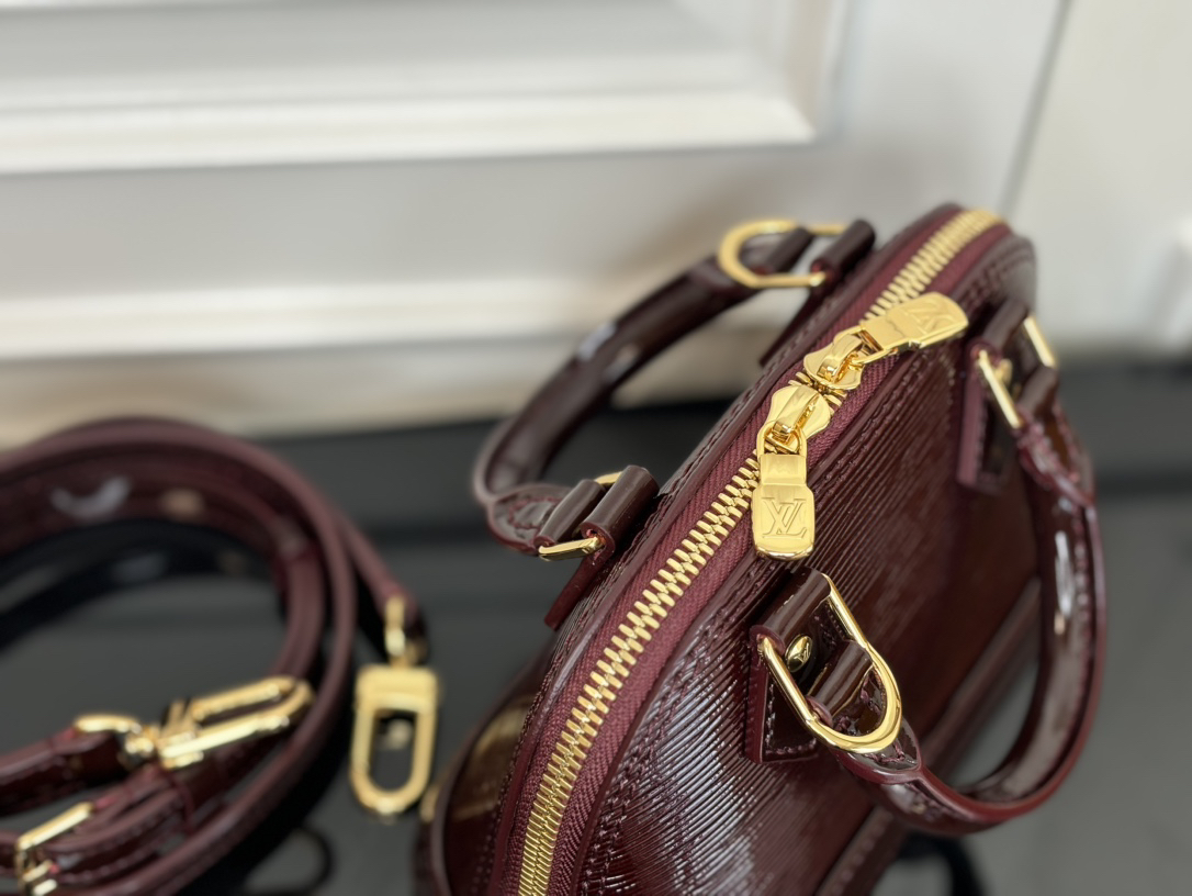 Louis Vuitton Nano Alma Handbag in Glossy Burgundy Epi Leather - Image 4