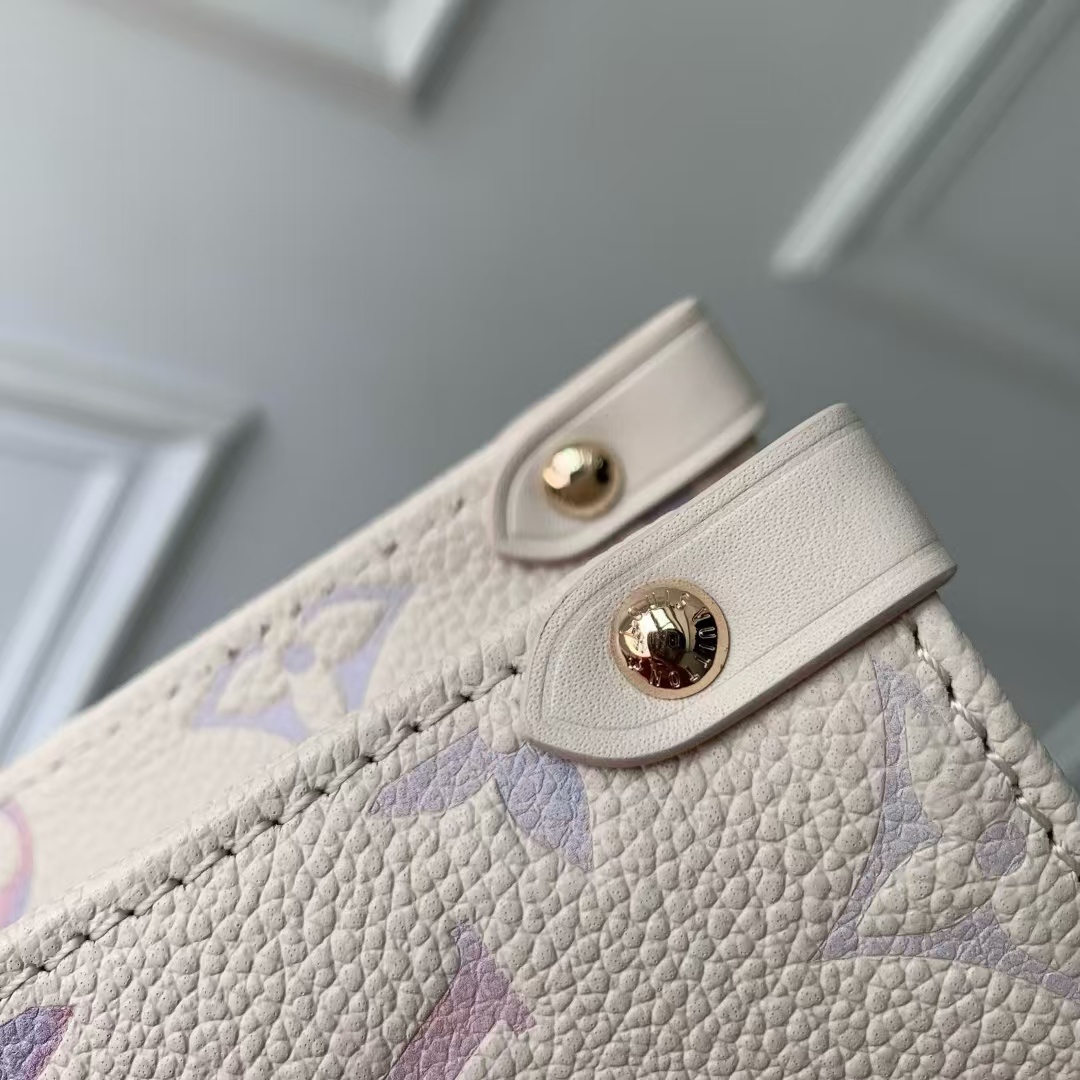 OnTheGo Small Handbag in Monogram Empreinte Leather - Image 5