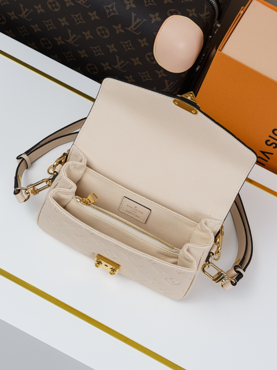 Pochette Métis East West Bag in Cream Monogram Empreinte Leather - Image 5