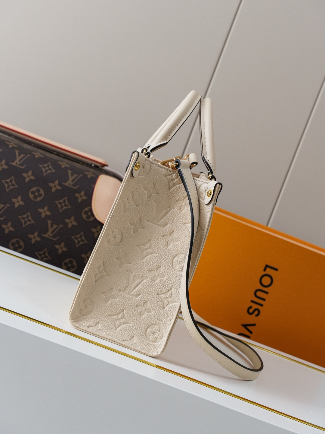 Louis Vuitton OnTheGo Small Handbag in Cream Monogram Empreinte Leather - Image 5