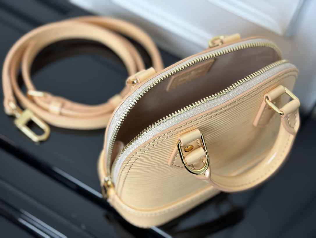 Louis Vuitton Nano Alma Epi Leather Crossbody Bag in Almond - Image 5